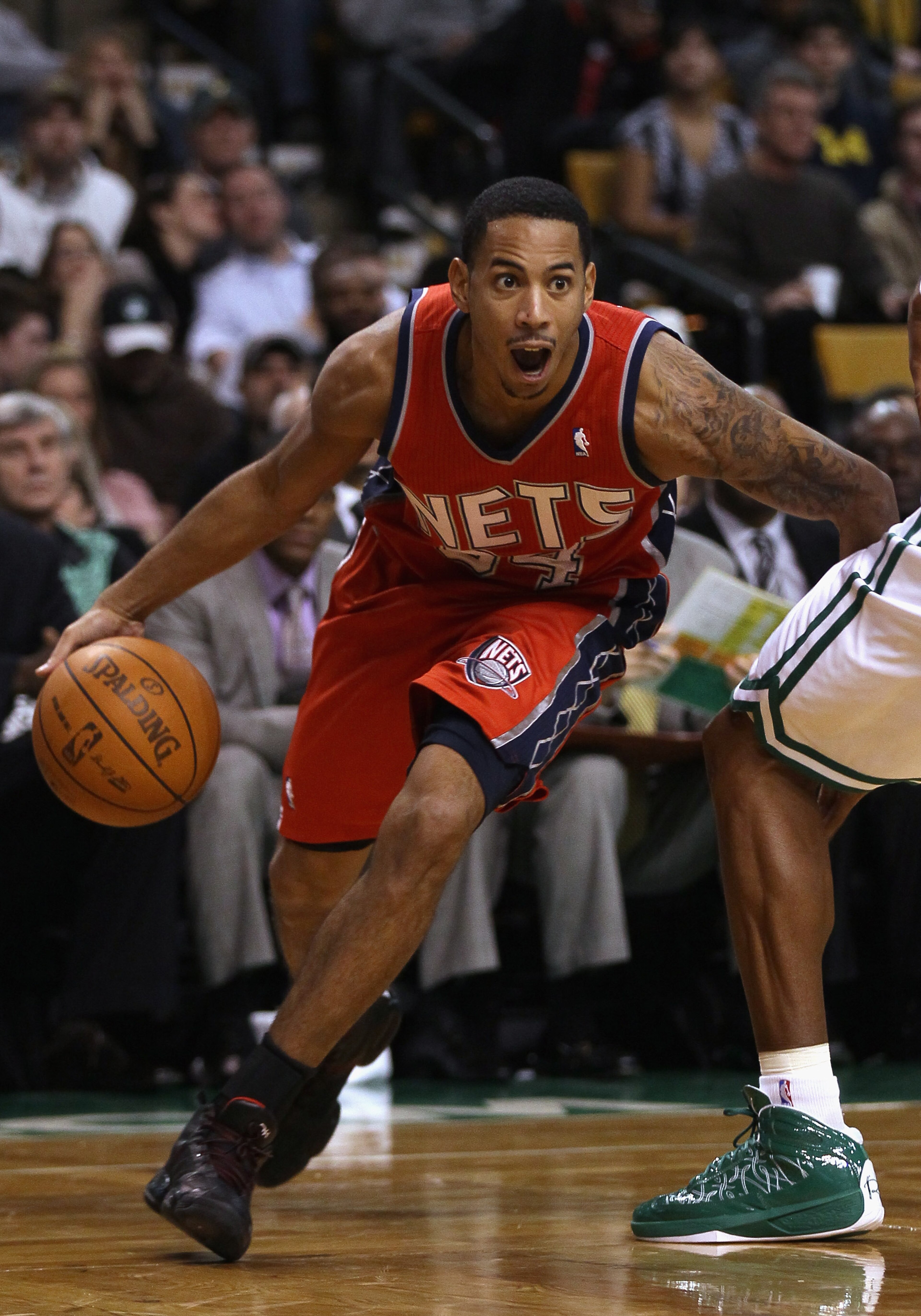 BOSTON - NOVEMBER 24: Devin Harris #34 of the New Jersey Nets drives to the basket in the second half against the Boston Celtics on November 24, 2010 at the TD Garden in Boston, Massachusetts. The Celtics defeated the nets 89-83. NOTE TO USER: User expre BOSTON - NOVEMBER 24: Devin Harris #34 of the New Jersey Nets drives to the basket in the second half against the Boston Celtics on November 24, 2010 at the TD Garden in Boston, Massachusetts. The Celtics defeated the nets 89-83. NOTE TO USER: User expre