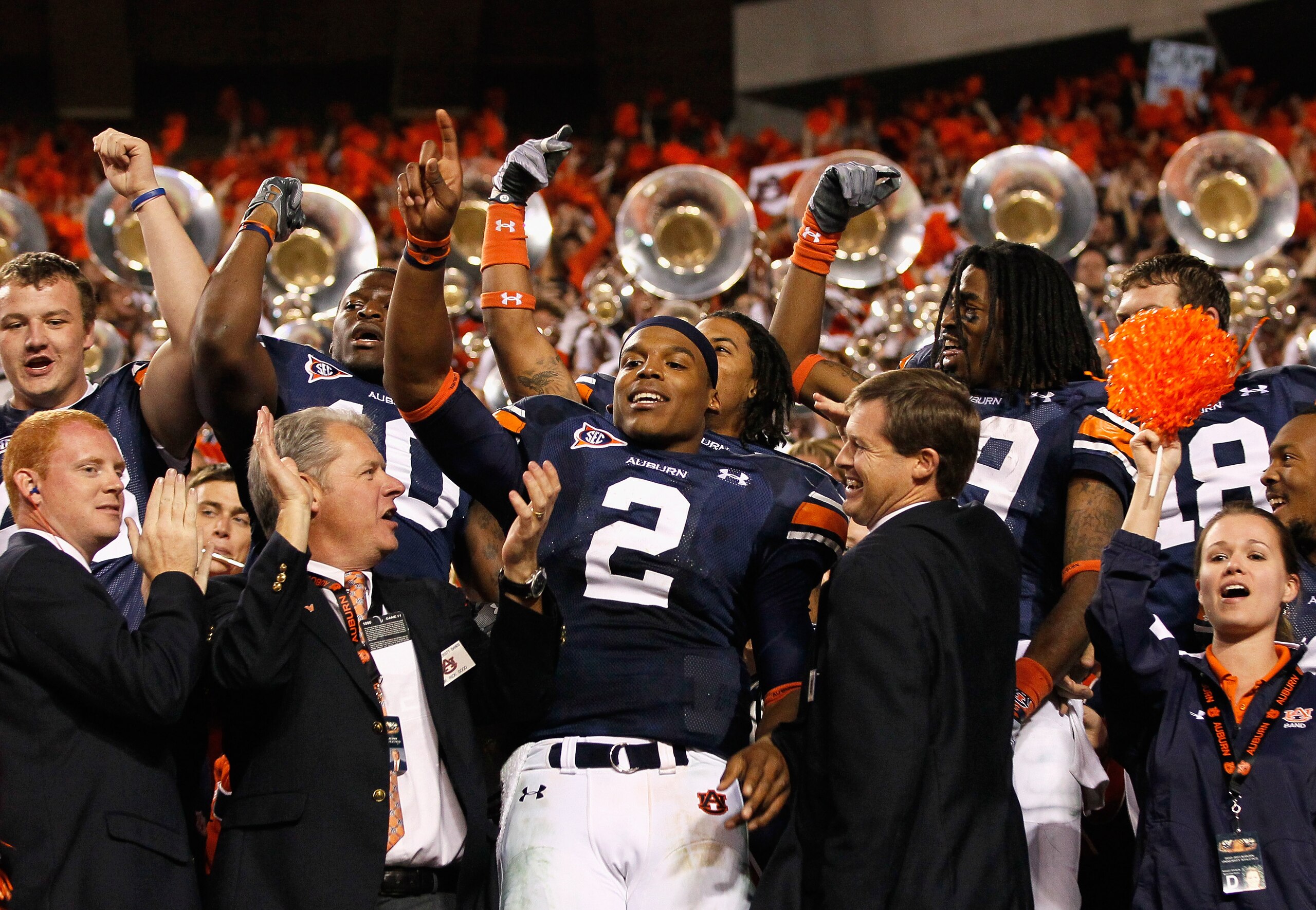 AUBURN, AL - NOVEMBER 13:  Quarterback Cameron Newton #2 of the Auburn Tigers celebrates with fans after their 49-31 win over the Georgia Bulldogs at Jordan-Hare Stadium on November 13, 2010 in Auburn, Alabama.  (Photo by Kevin C. Cox/Getty Images)