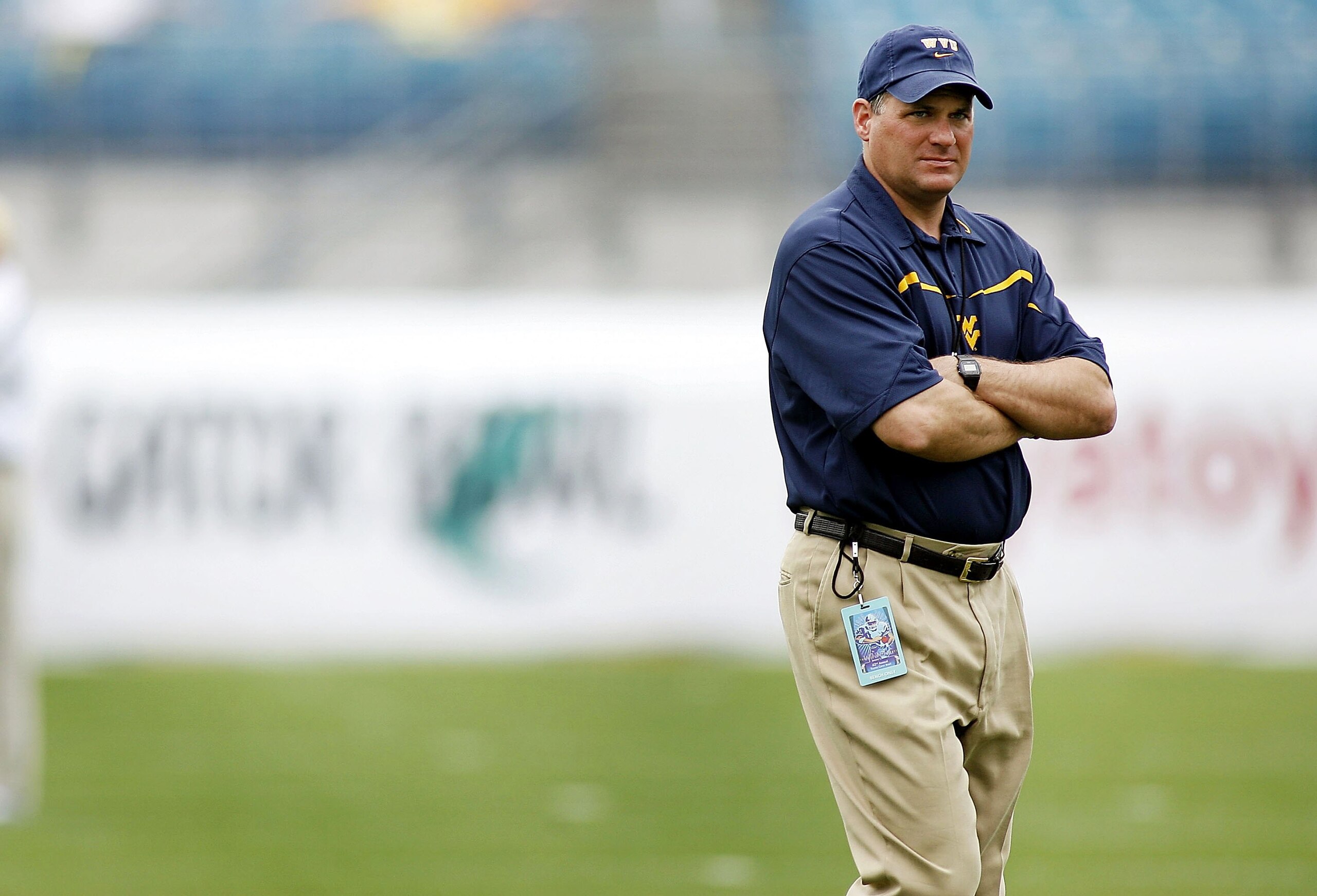 JACKSONVILLE, FL - JANUARY 01:  Head coach Rich Rodriguez of the West Virginia Mountaineers walks the sidelines prior to taking on the Georgia Tech Yellow Jackets in the Toyota Gator Bowl at Alltel Stadium January 1, 2007 in Jacksonville, Florida.  (Photo