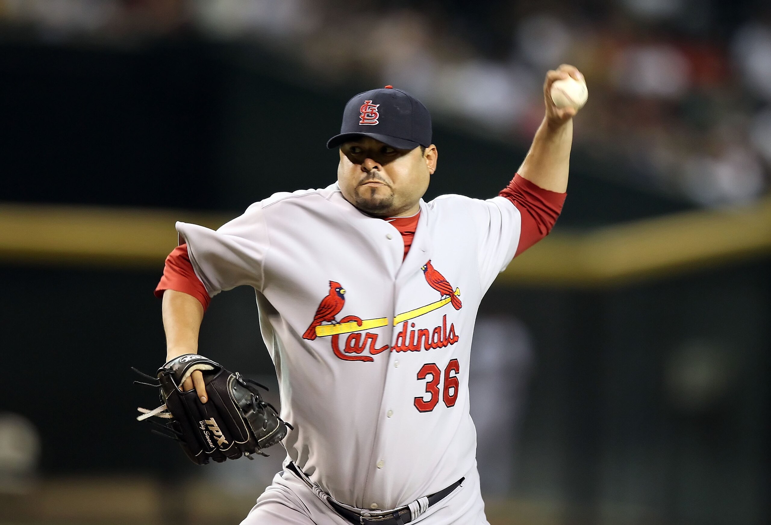 PHOENIX - JUNE 11:  Relief pitcher Dennys Reyes #36 of the St. Louis Cardinals pitches against the Arizona Diamondbacks during the Major League Baseball game at Chase Field on June 11, 2010 in Phoenix, Arizona. The Cardinals defeated the Diamondbacks 5-2.