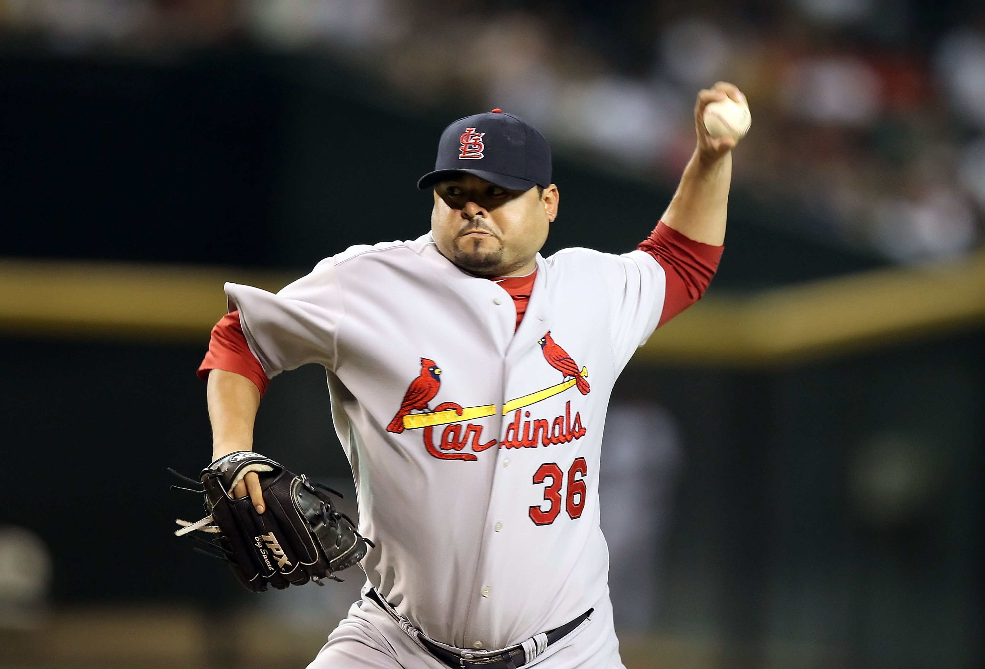 PHOENIX - JUNE 11:  Relief pitcher Dennys Reyes #36 of the St. Louis Cardinals pitches against the Arizona Diamondbacks during the Major League Baseball game at Chase Field on June 11, 2010 in Phoenix, Arizona. The Cardinals defeated the Diamondbacks 5-2.