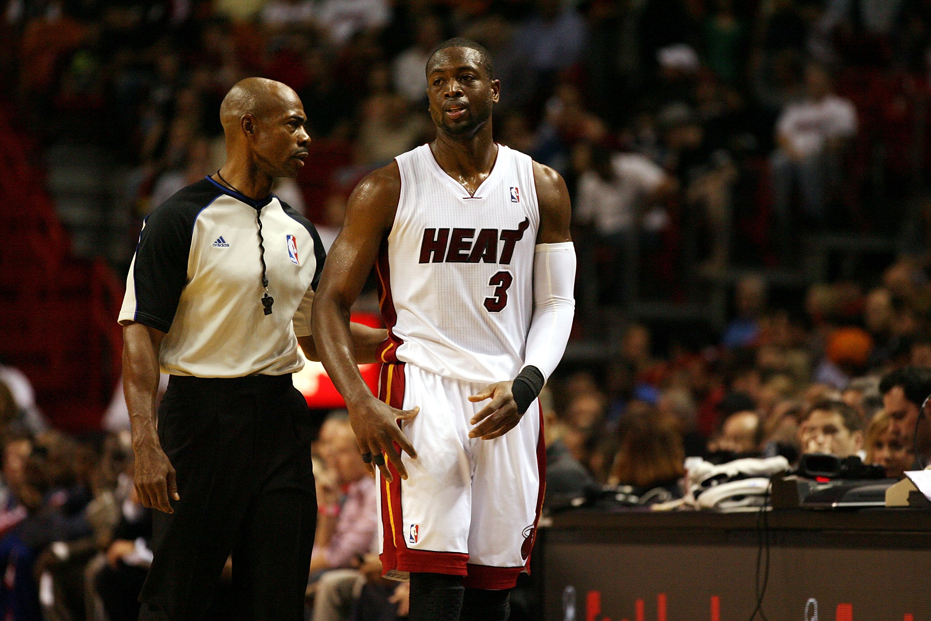 MIAMI - NOVEMBER 26:  Guard Dwyane Wade #3 of the Miami Heat talks to the referee against the Philadelphia 76ers at American Airlines Arena on November 26, 2010 in Miami, Florida. The Heat defeated the 76ers 99-90.  (Photo by Marc Serota/Getty Images)