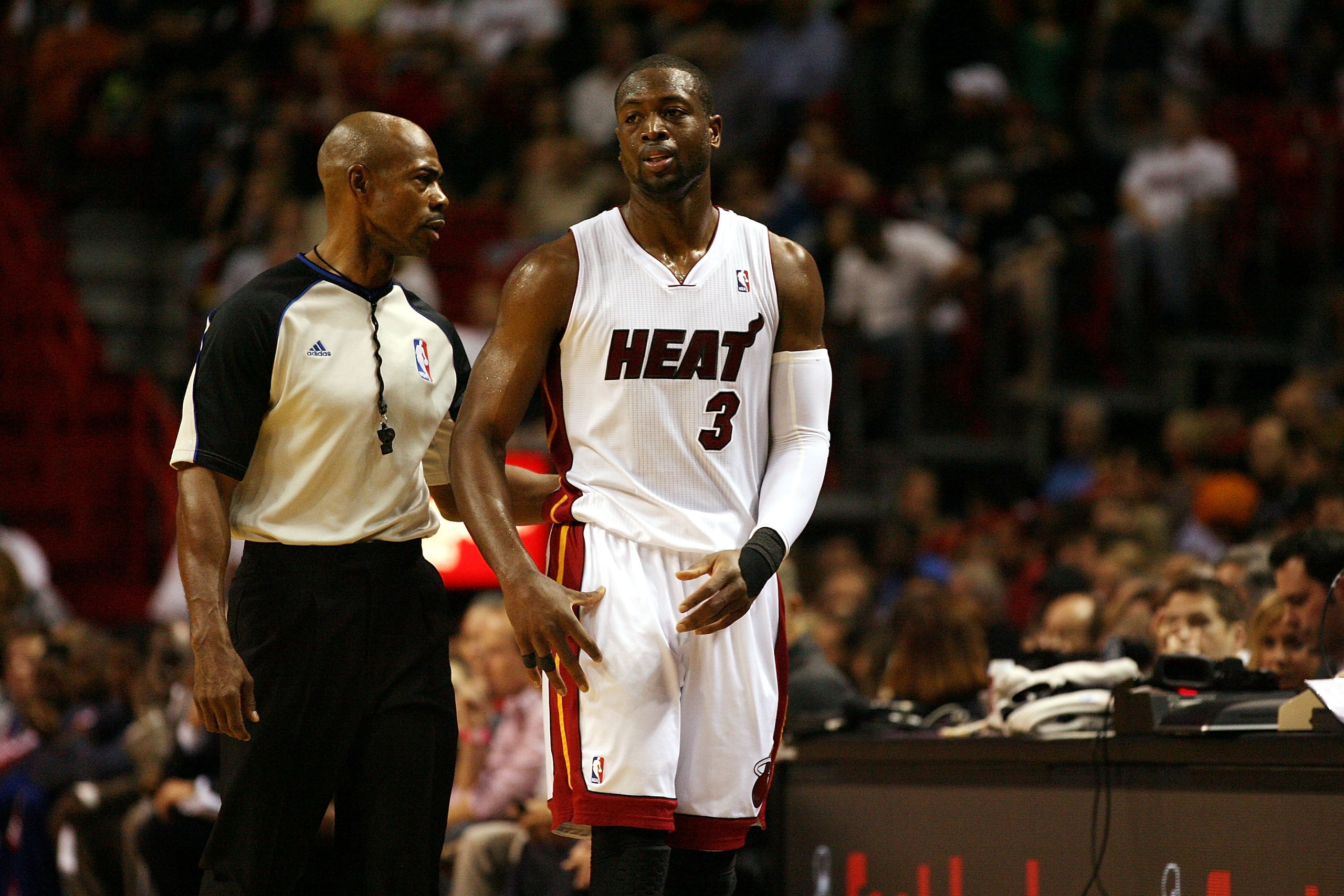 MIAMI - NOVEMBER 26:  Guard Dwyane Wade #3 of the Miami Heat talks to the referee against the Philadelphia 76ers at American Airlines Arena on November 26, 2010 in Miami, Florida. The Heat defeated the 76ers 99-90.  (Photo by Marc Serota/Getty Images)