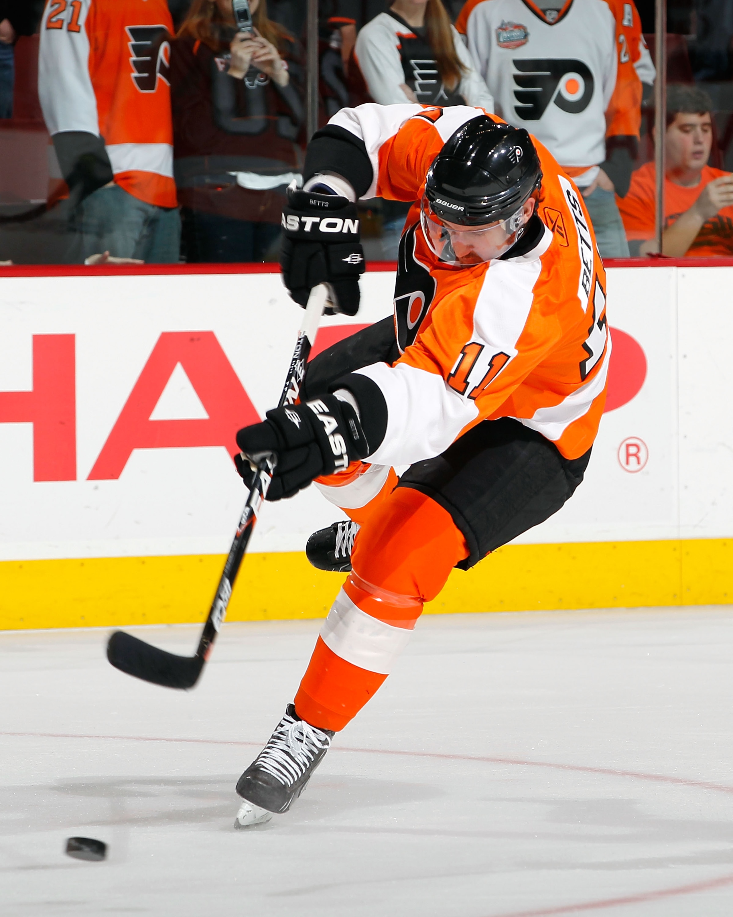 PHILADELPHIA - NOVEMBER 26:  Blair Betts #11 of the Philadelphia Flyers shoots during warmups before a hockey game against the Calgary Flames at the Wells Fargo Center on November 26, 2010 in Philadelphia, Pennsylvania.  The Flames won 3-2. (Photo by Paul