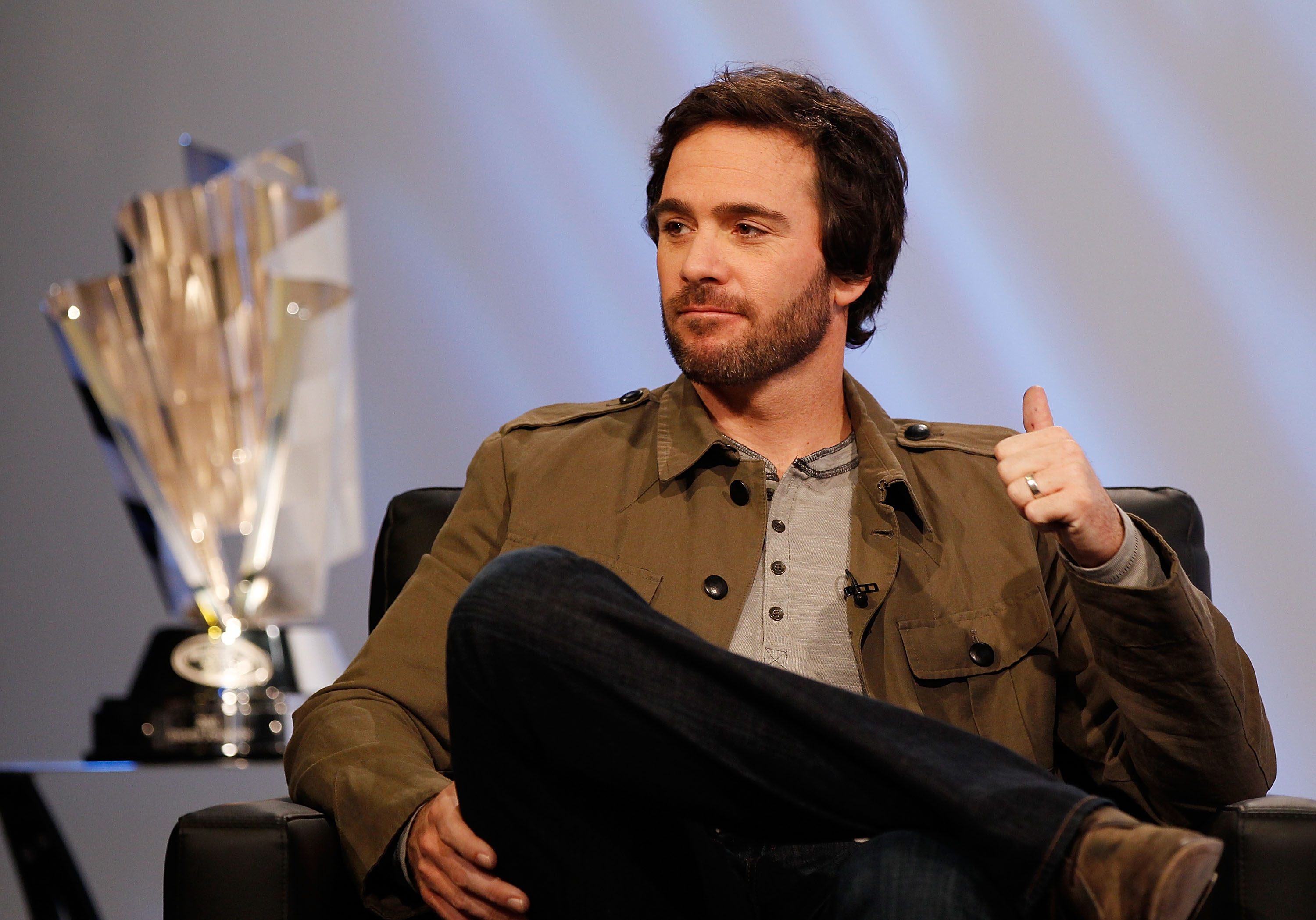 NEW YORK - NOVEMBER 23:  2010 NASCAR Sprint Cup Champion Jimmie Johnson, driver of the #48 Lowe's Chevrolet is interviewed by host Kyle Petty (not pictured) during the taping of 'No Restrictor Plate' a one hour show to air on SPEED TV during 2010 NASCAR S