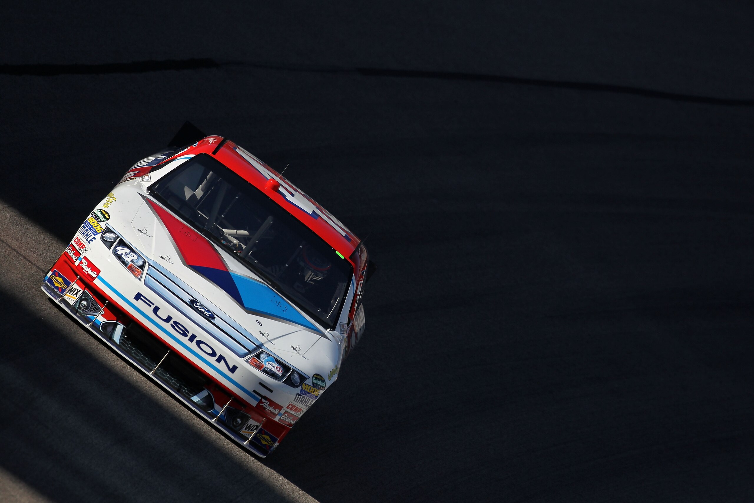 FORT WORTH, TX - NOVEMBER 05: A.J. Allmendinger drives the #43 Valvoline Ford during practice for the NASCAR Sprint Cup Series AAA Texas 500 at Texas Motor Speedway on November 5, 2010 in Fort Worth, Texas. (Photo by Jonathan Ferrey/Getty Images for NAS FORT WORTH, TX - NOVEMBER 05: A.J. Allmendinger drives the #43 Valvoline Ford during practice for the NASCAR Sprint Cup Series AAA Texas 500 at Texas Motor Speedway on November 5, 2010 in Fort Worth, Texas. (Photo by Jonathan Ferrey/Getty Images for NAS