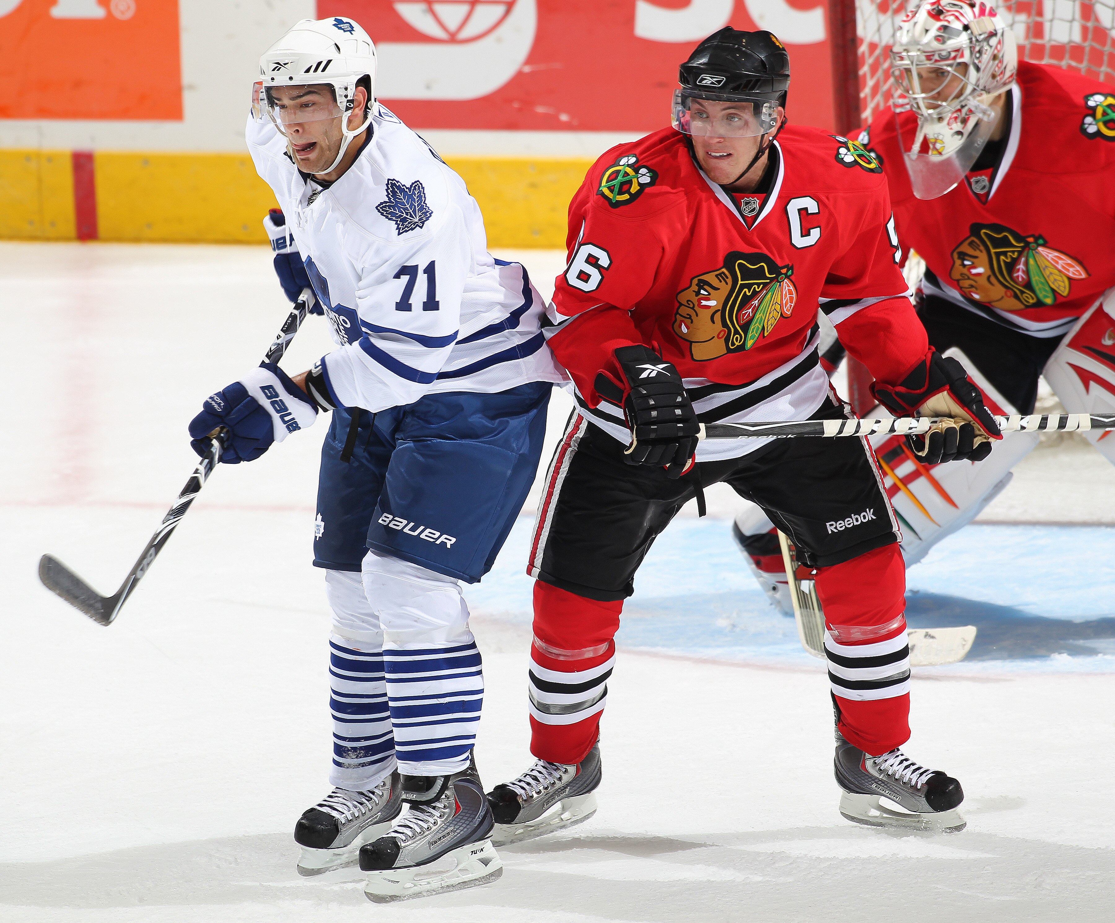 LONDON, CANADA - SEPTEMBER 11:  Jerry D'Amigo #71 of the Toronto Maple Leafs looks to tip a shot next to Brian Connelly #56 of the Chicago Black Hawks in a game during the NHL Rookie Tournament on September 11,2010 at the John Labatt Centre in London,Onta