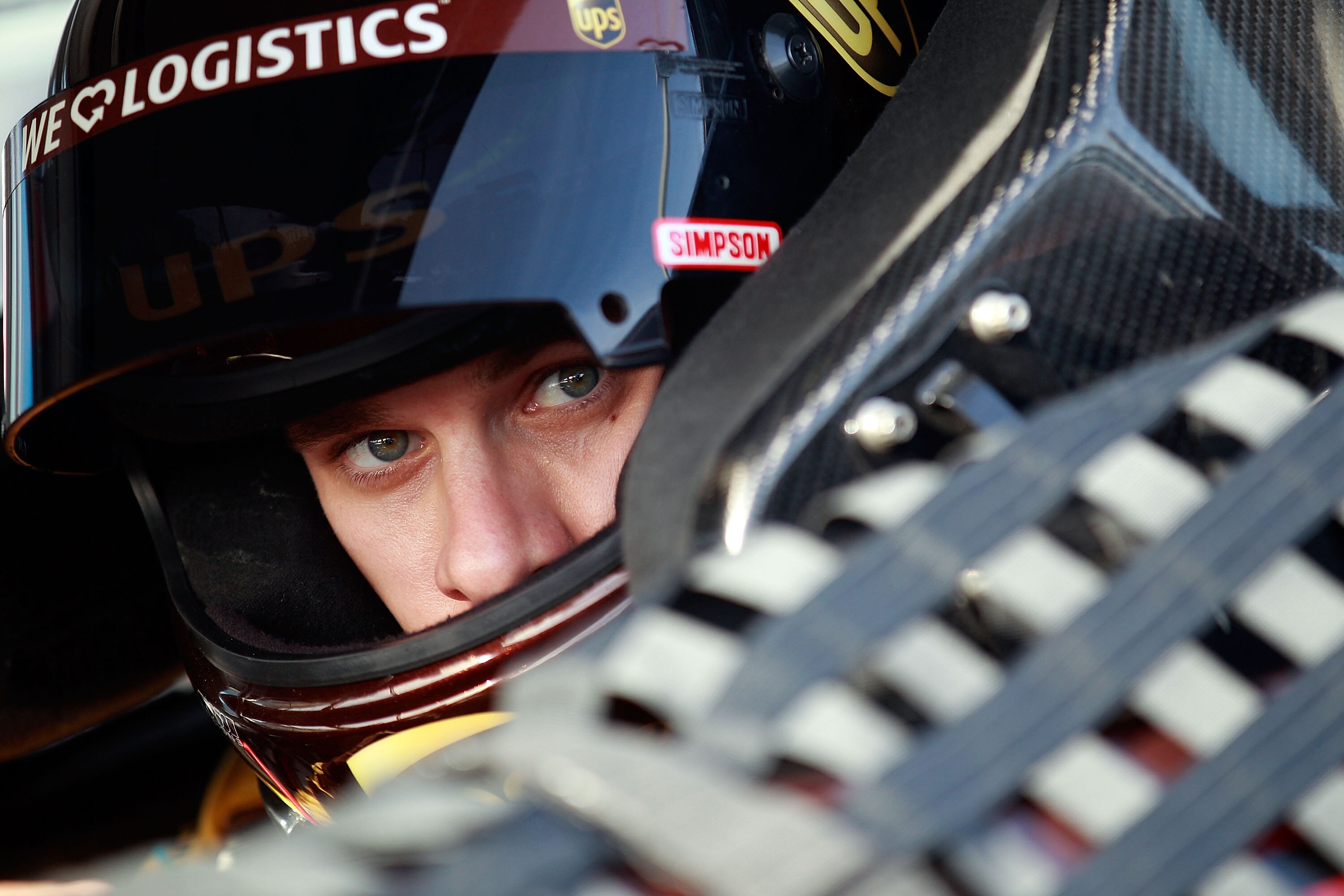 HOMESTEAD, FL - NOVEMBER 19:  David Ragan, driver of the #6 UPS Ford, sits in his car during qualifying for the NASCAR Sprint Cup Series Ford 400 at Homestead-Miami Speedway on November 19, 2010 in Homestead, Florida.  (Photo by Chris Graythen/Getty Image