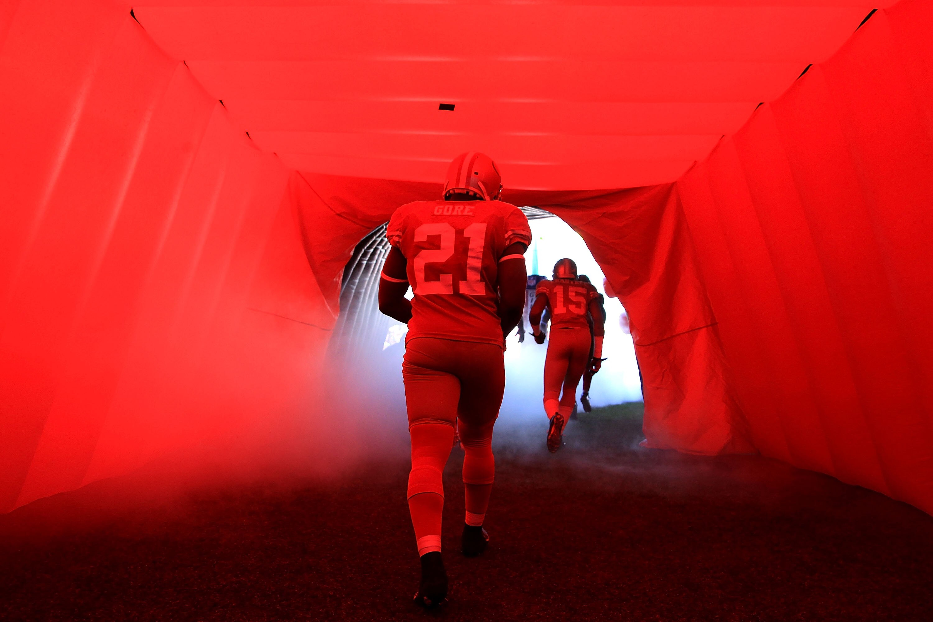 SAN FRANCISCO - NOVEMBER 14:  Frank Groe #21 of the San Francisco 49ers enters the field for their game against the St. Louis Rams at Candlestick Park on November 14, 2010 in San Francisco, California.  (Photo by Ezra Shaw/Getty Images)