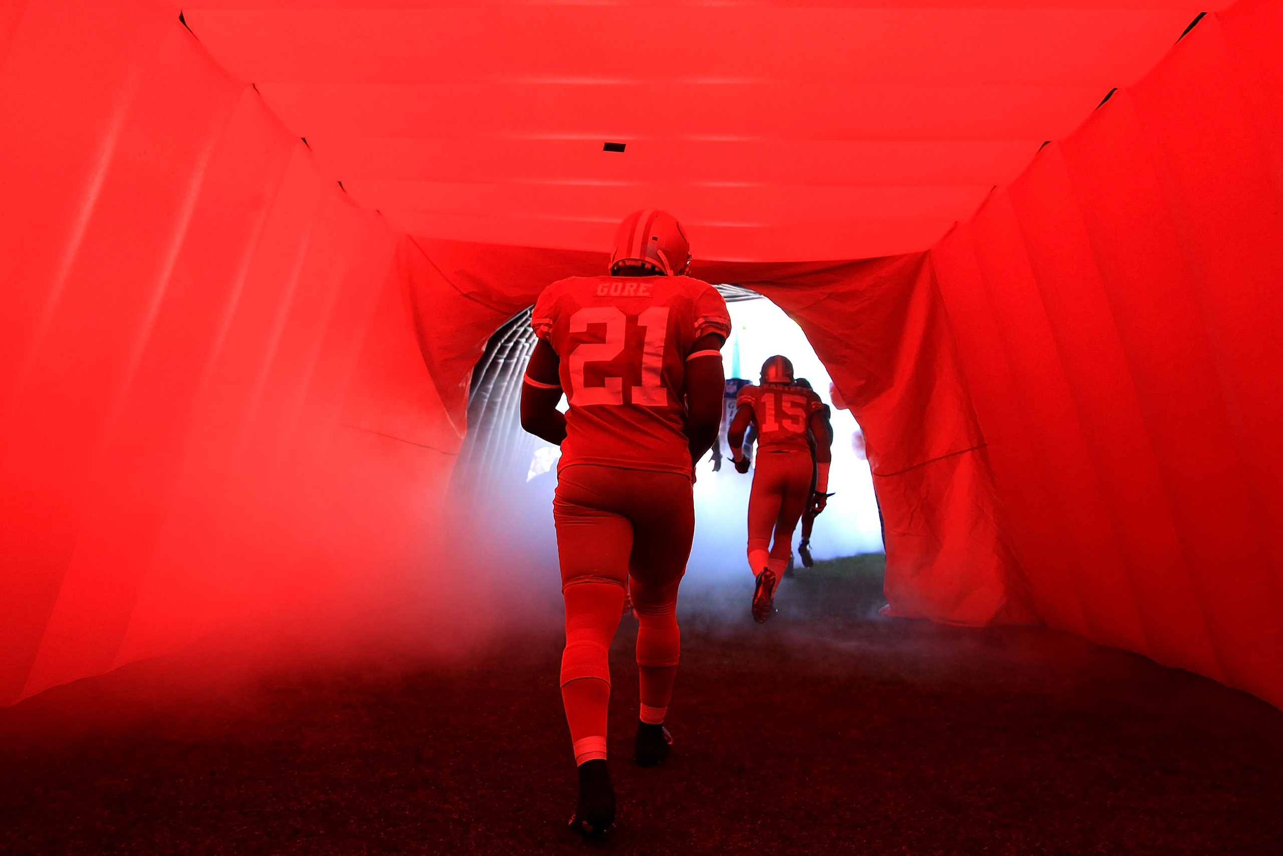SAN FRANCISCO - NOVEMBER 14:  Frank Groe #21 of the San Francisco 49ers enters the field for their game against the St. Louis Rams at Candlestick Park on November 14, 2010 in San Francisco, California.  (Photo by Ezra Shaw/Getty Images)