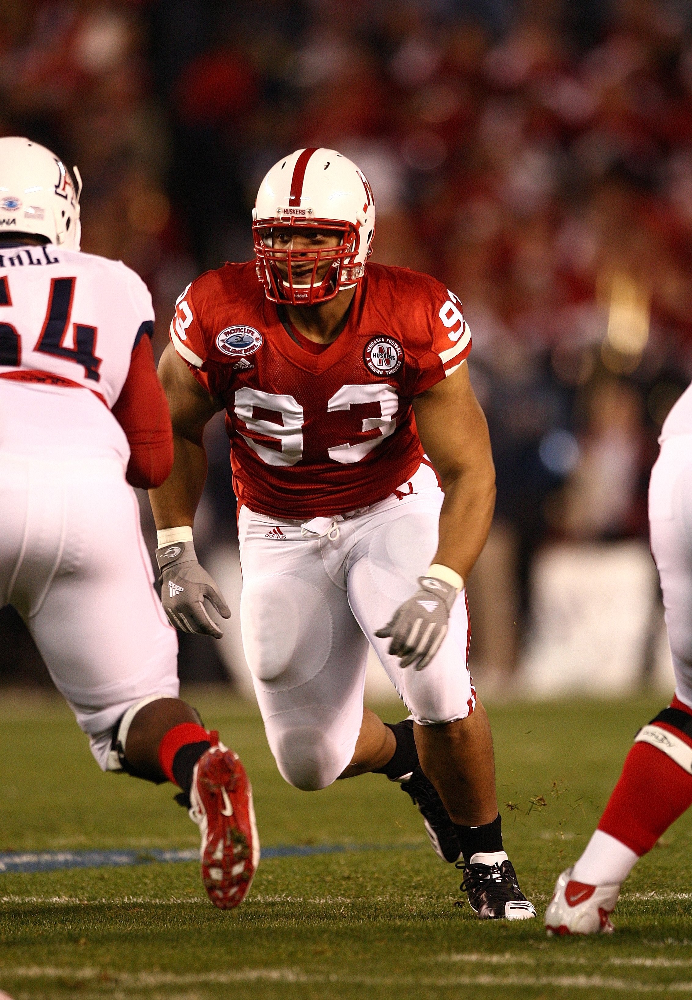 SAN DIEGO - DECEMBER 30:  Ndamukong Suh #93 of the University of Nebraska Cornhuskers pursues the play during the Pacific Life Holiday Bowl against University of Arizona Wildcats on December 30, 2009 at Qualcomm Stadium in San Diego, California. The Cornh