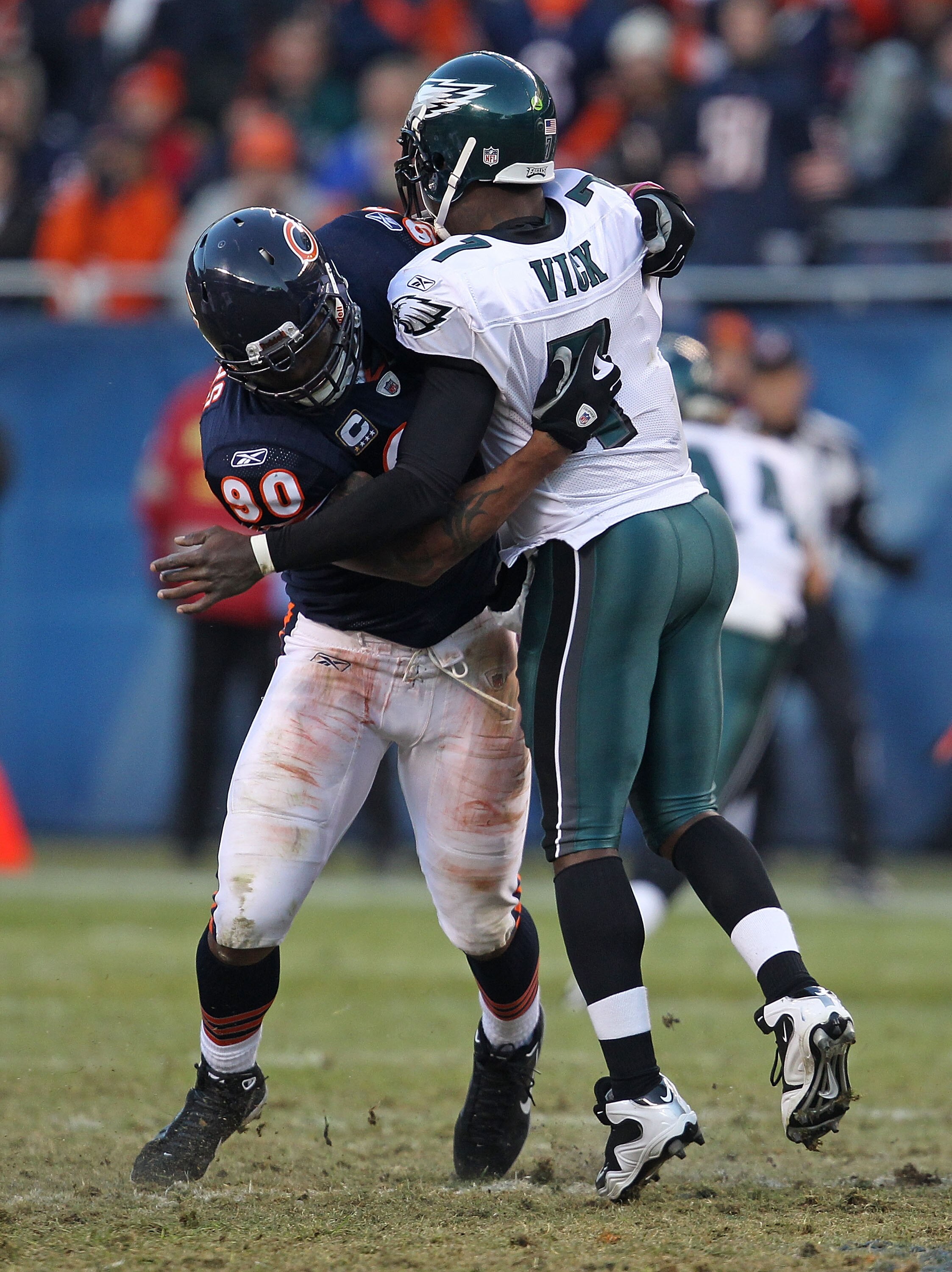 CHICAGO - NOVEMBER 28: Julius Peppers #90 of the Chicago Bears hits Michael Vick #7 of the Philadelphia Eagles at Soldier Field on November 28, 2010 in Chicago, Illinois. The Bears defeated the Eagles 31-26. (Photo by Jonathan Daniel/Getty Images) CHICAGO - NOVEMBER 28: Julius Peppers #90 of the Chicago Bears hits Michael Vick #7 of the Philadelphia Eagles at Soldier Field on November 28, 2010 in Chicago, Illinois. The Bears defeated the Eagles 31-26. (Photo by Jonathan Daniel/Getty Images)