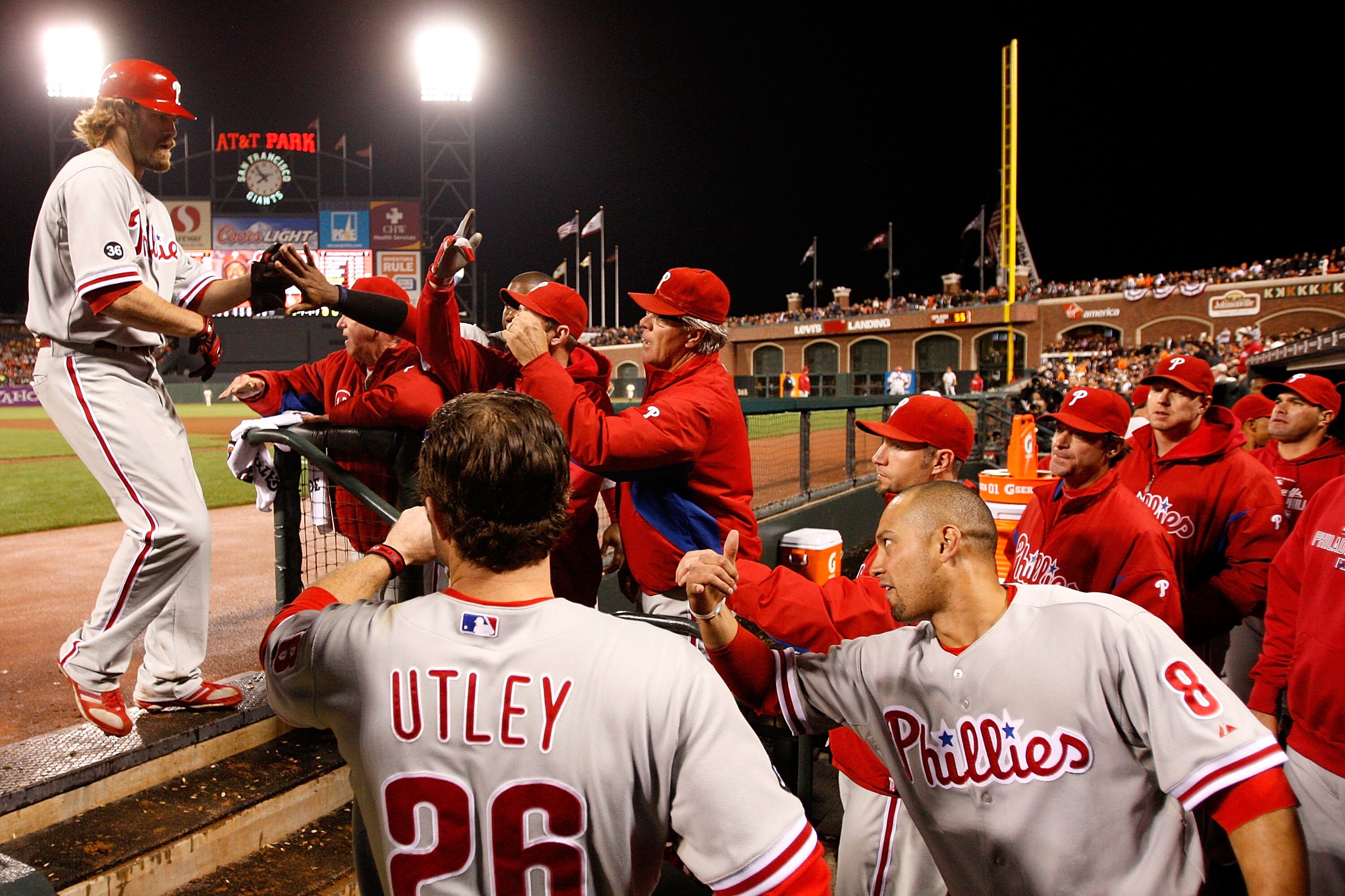 SAN FRANCISCO - OCTOBER 21:  Jayson Werth #28 of the Philadelphia Phillies celebrates a solo home run in the dugout with his teammates while taking on the San Francisco Giants in the ninth inning of Game Five of the NLCS during the 2010 MLB Playoffs at AT