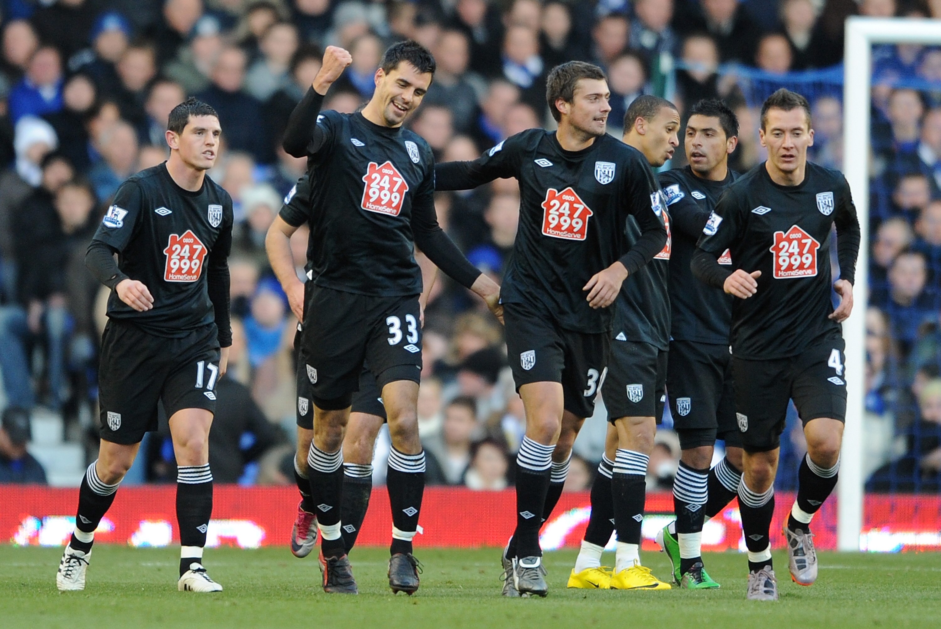 LIVERPOOL, ENGLAND - NOVEMBER 27:  Paul Scharner of West Bromwich Albion celebrates scoring the opening goal during the Barclays Premier League match between Everton and West Bromwich Albion at Goodison Park on November 27, 2010 in Liverpool, England.  (P