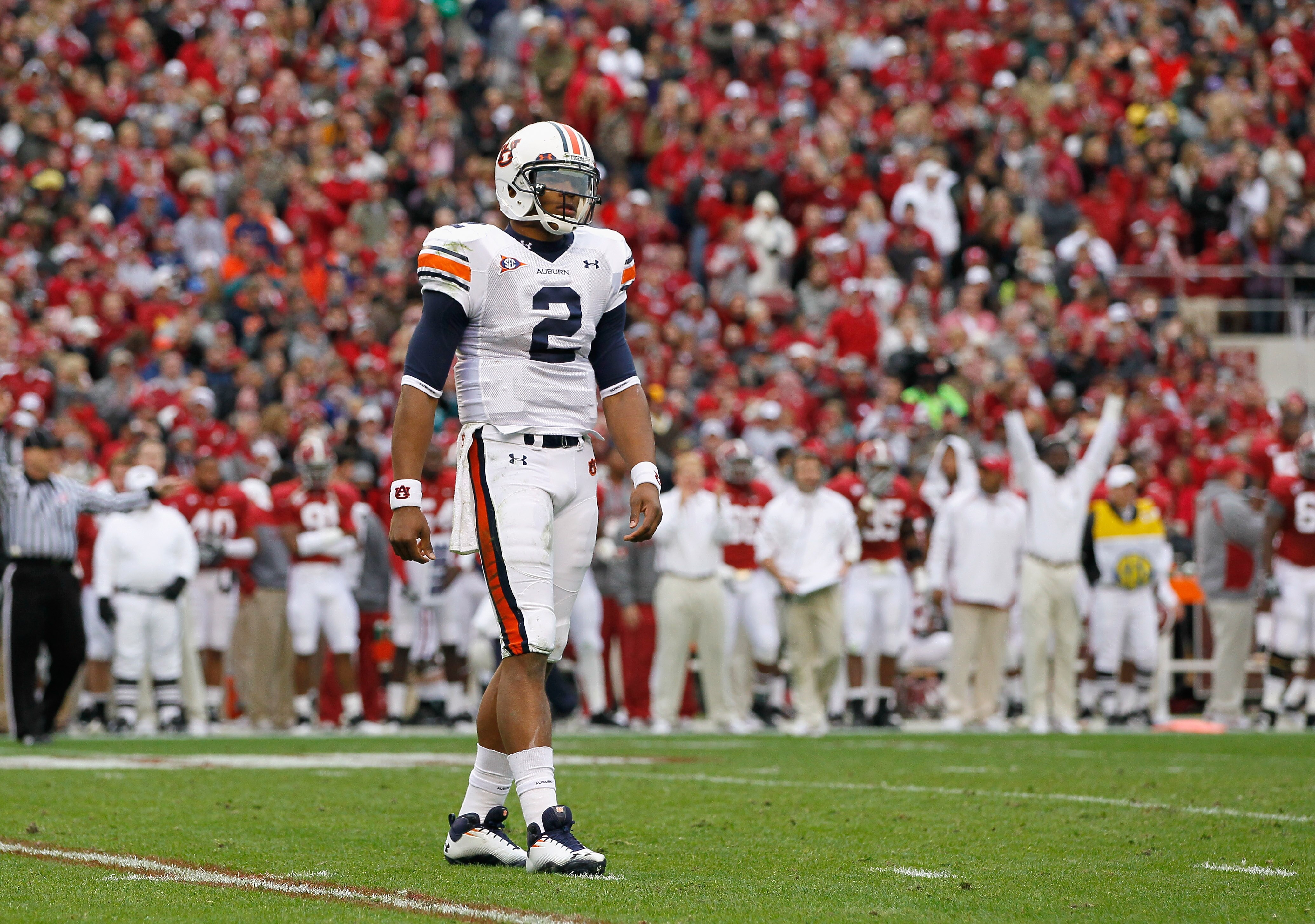 TUSCALOOSA, AL - NOVEMBER 26:  Quarterback Cam Newton #2 of the Auburn Tigers looks to the sidelines for a play call against the Alabama Crimson Tide at Bryant-Denny Stadium on November 26, 2010 in Tuscaloosa, Alabama.  (Photo by Kevin C. Cox/Getty Images