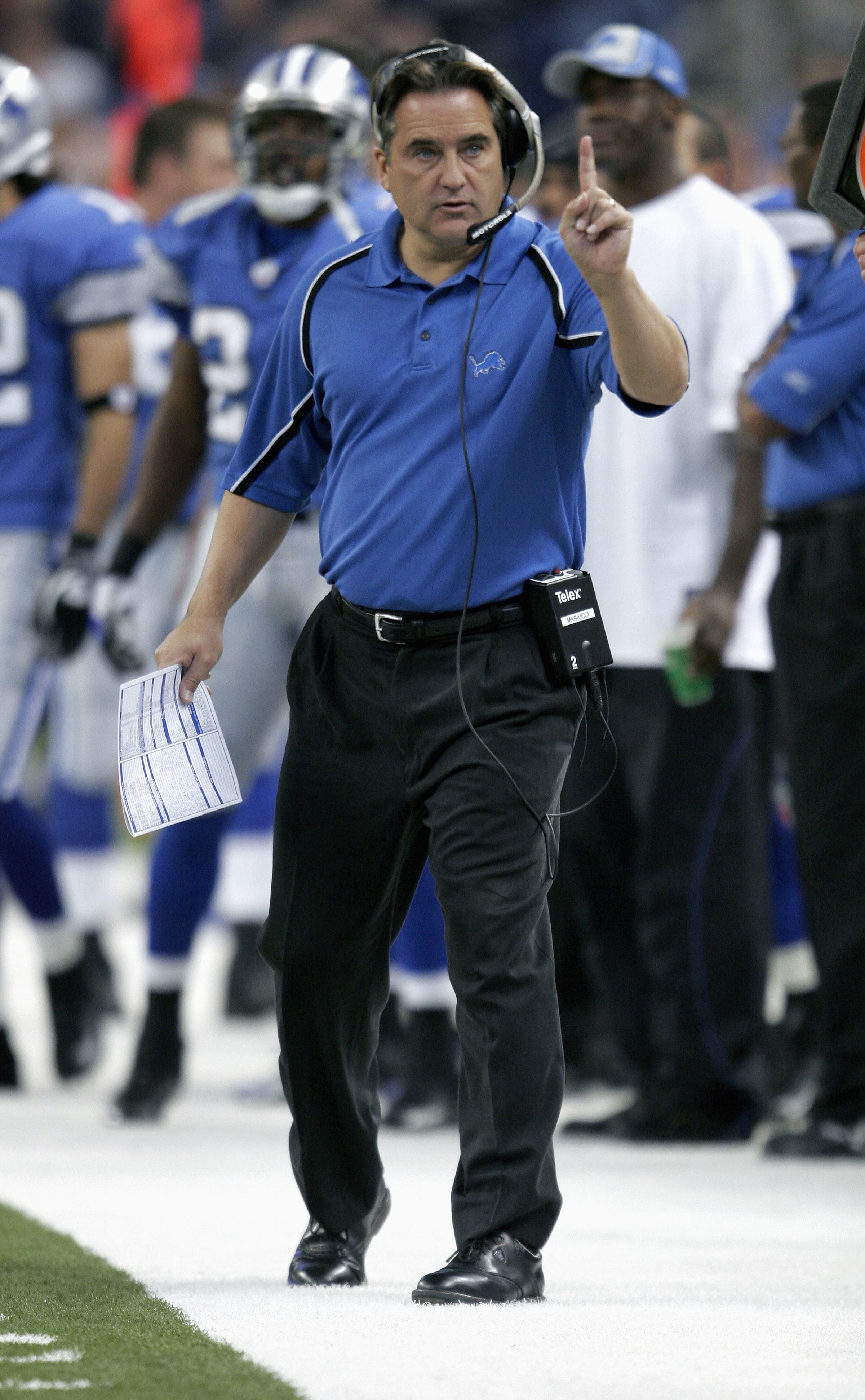 DETROIT - OCTOBER 30:  Head Coach Steve Mariucci of the Detroit Lions calls a play during the NFL game with the Chicago Bears at Ford Field on October 30, 2005 in Detroit, Michigan.  The Bears won 19-13. (Photo by Tom Pidgeon/Getty Images)