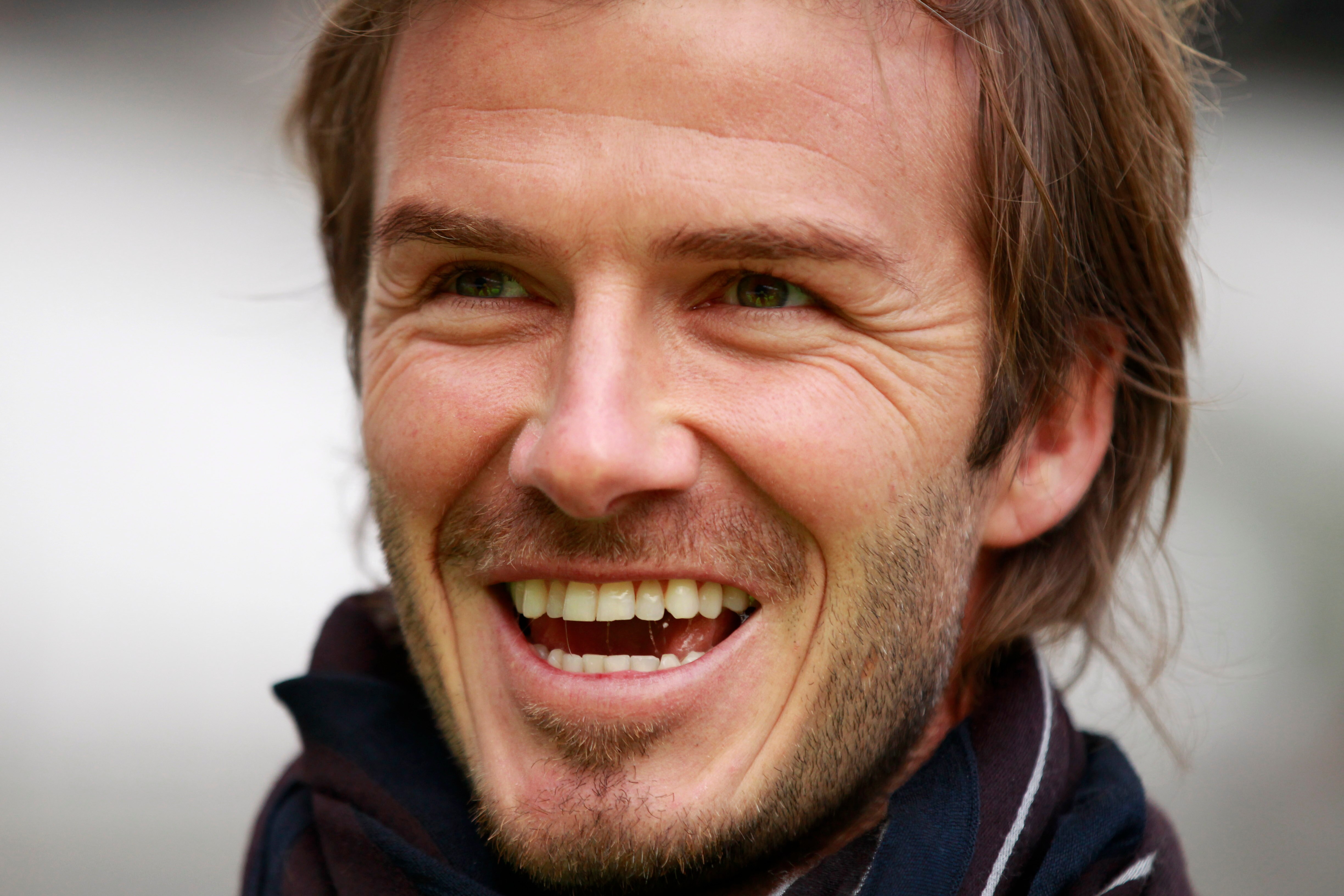 LONDON - NOVEMBER 29:  British football player David Beckham speaks to members of the media during a visit to the main Olympic stadium on November 29, 2010 in London, England.  The Olympic stadium is under construction for the London 2012 Olympics.  (Phot