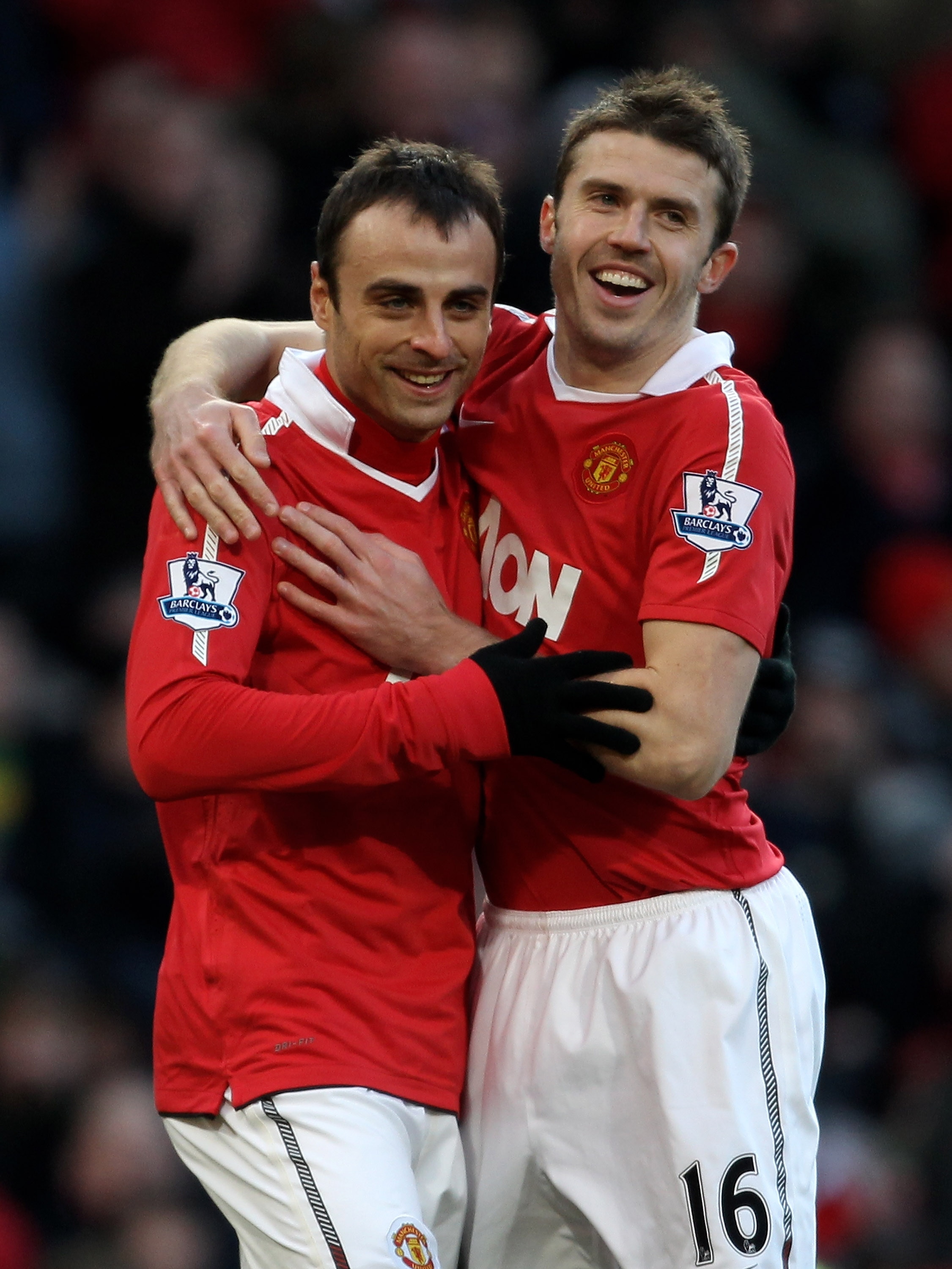 MANCHESTER, ENGLAND - NOVEMBER 27:  Dimitar Berbatov (L) of Manchester United is congratulated by team mate Michael Carrick after scoring the opening goal during the Barclays Premier League match between Manchester United and Blackburn Rovers at Old Traff