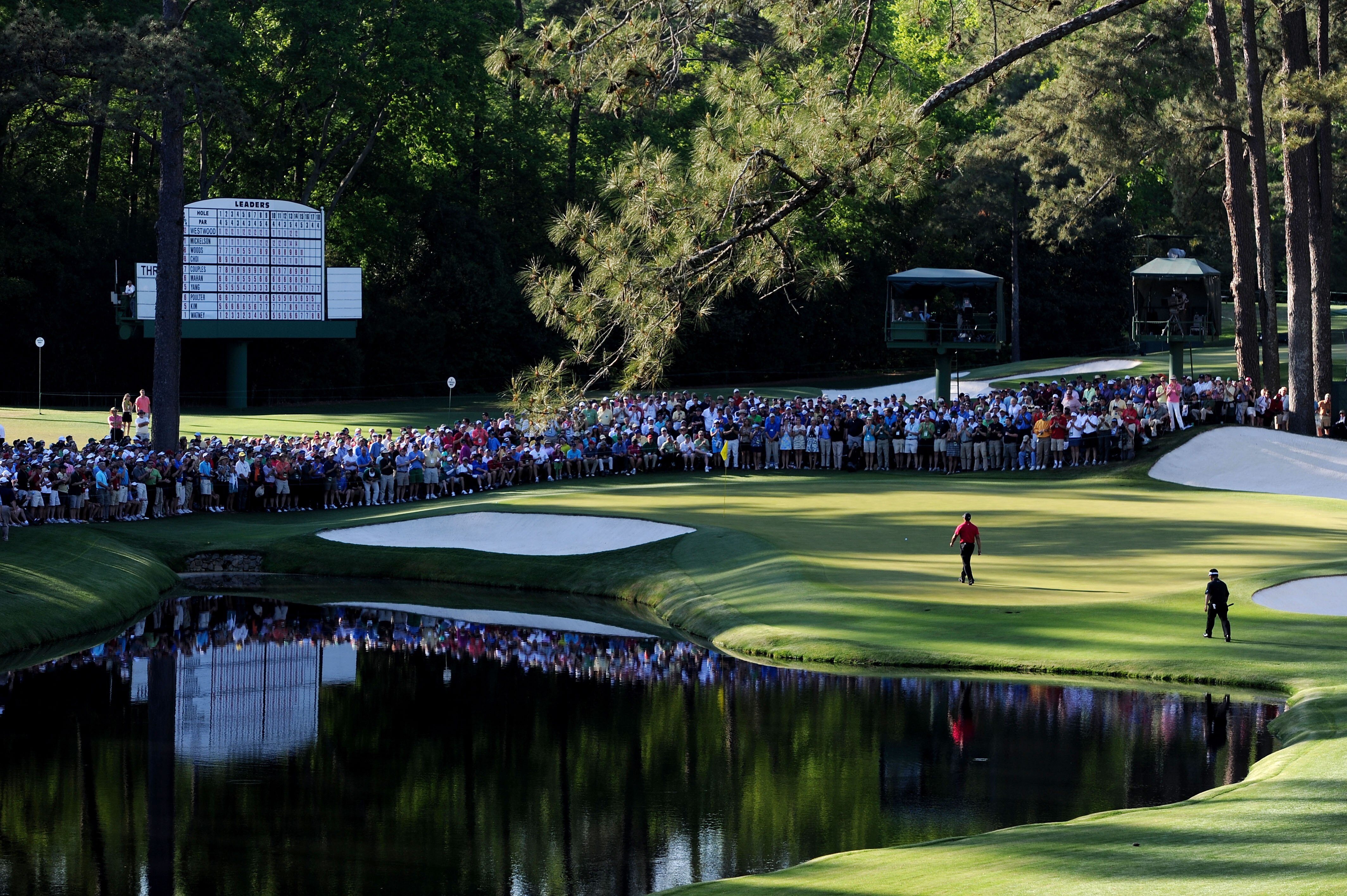 AUGUSTA, GA - APRIL 11:  Tiger Woods (L) and K.J. Choi of South Korea walk to the 16th green during the final round of the 2010 Masters Tournament at Augusta National Golf Club on April 11, 2010 in Augusta, Georgia.  (Photo by Harry How/Getty Images)