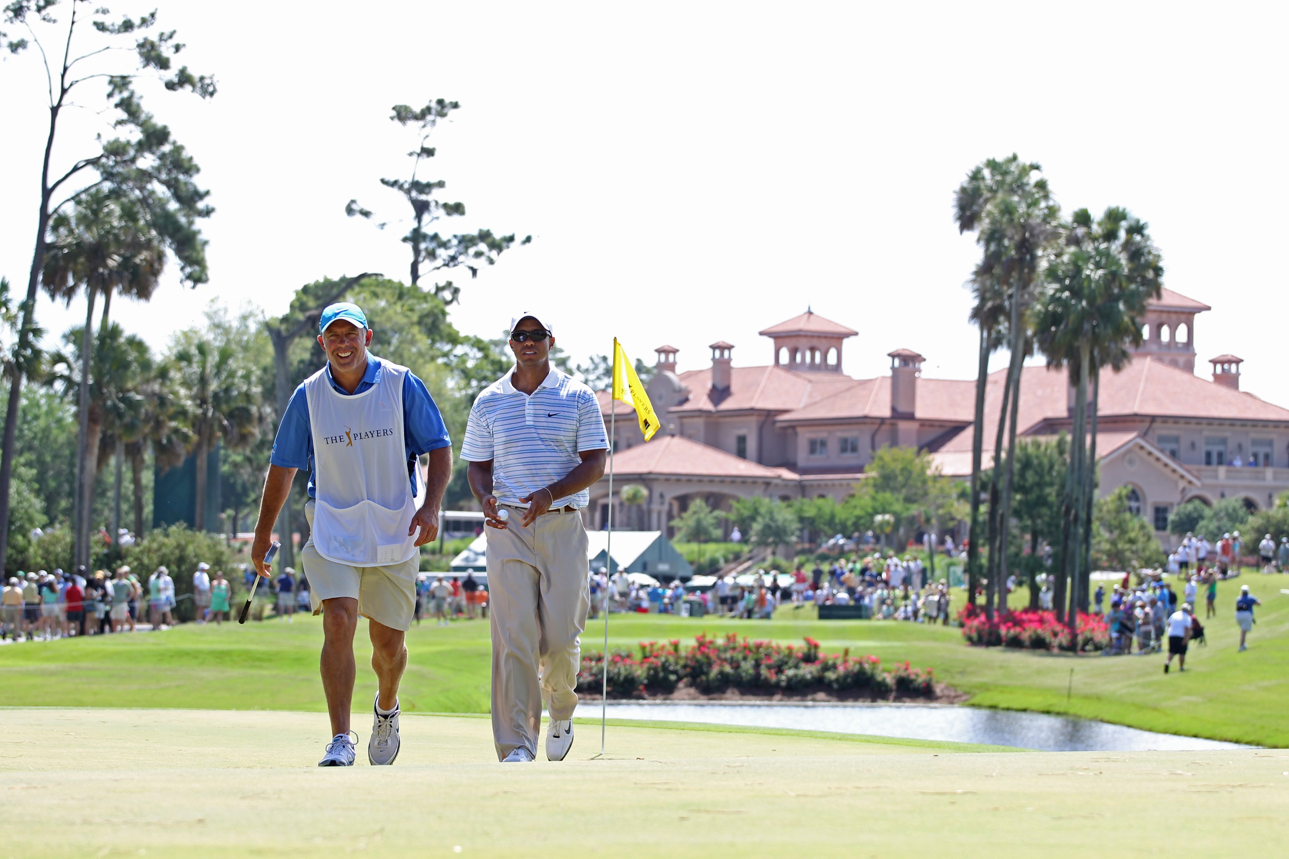 PONTE VEDRA BEACH, FL - MAY 8:  Tiger Woods and caddie Steve Williams walk from the 3rd green during the third round of THE PLAYERS Championship on THE PLAYERS Stadium Course at TPC Sawgrass on May 8, 2010 in Ponte Vedra Beach, Florida. (Photo by Jamie Sq