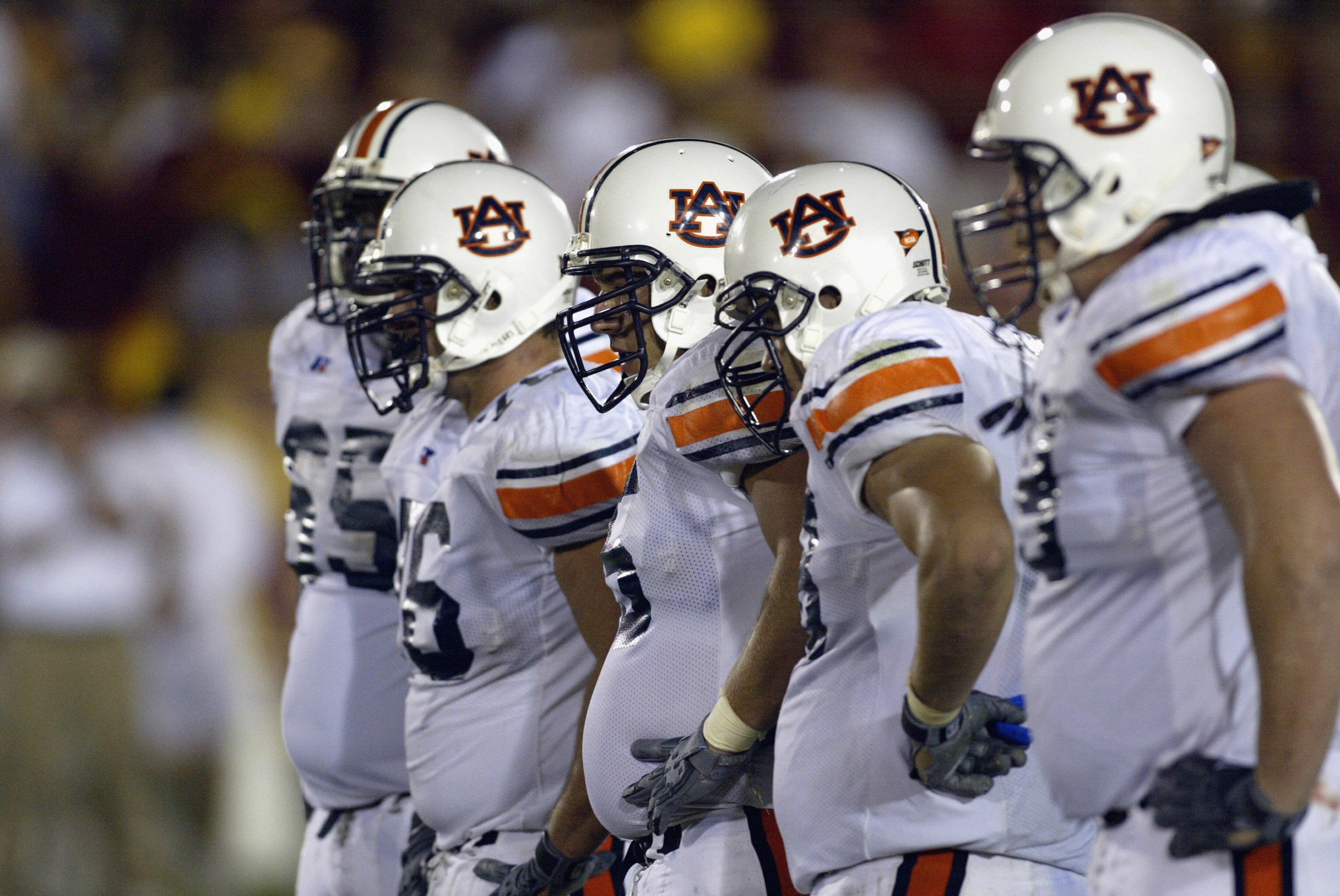 LOS ANGELES - SEPTEMBER 2:  The Offensive Line of the Auburn Tigers stand ready before the play against the USC Trojans during the game on September 2, 2002 at the Los Angeles Coliseum in Los Angeles, California.  USC defeated Auburn 24-17.  (Photo by Ste