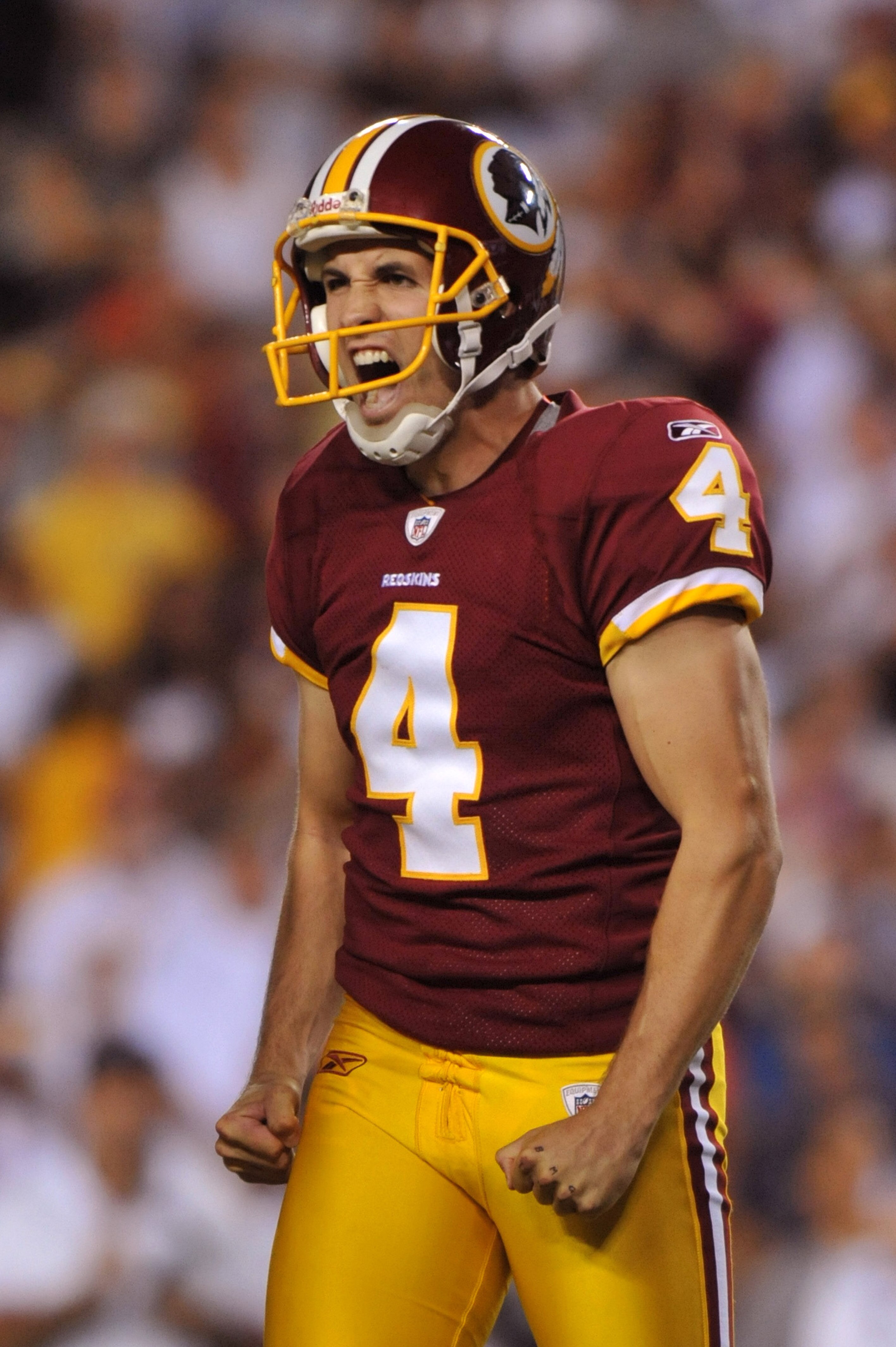 LANDOVER - SEPTEMBER 19:  Graham Gano #4 of the Washington Redskins reacts after missing a field goal in overtime against the Houston Texans at FedExField on September 19, 2010 in Landover, Maryland. The Texans defeated the Redskins in overtime 30-27. (Ph
