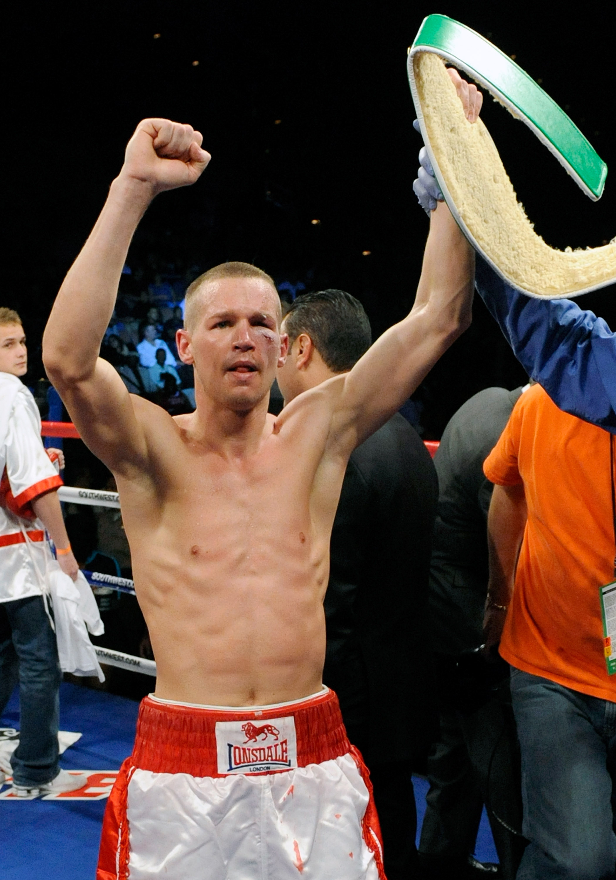 LAS VEGAS - APRIL 03:   Jason Litzau celebrates his win over Rocky Juarez in their super featherweight bout at the Mandalay Bay Events Center April 3, 2010 in Las Vegas, Nevada. Litzau won by technical unanimous decision after the fight was stopped in the