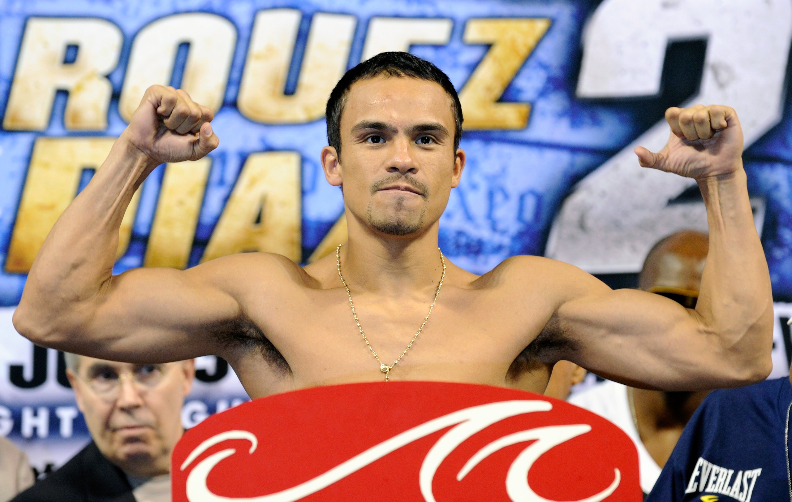 LAS VEGAS - JULY 30:  WBA/WBO lightweight champion Juan Manuel Marquez poses on the scale during the official weigh-in for his fight against Juan Diaz at the Mandalay Bay Events Center July 30, 2010 in Las Vegas, Nevada. Marquez will defend his titles aga