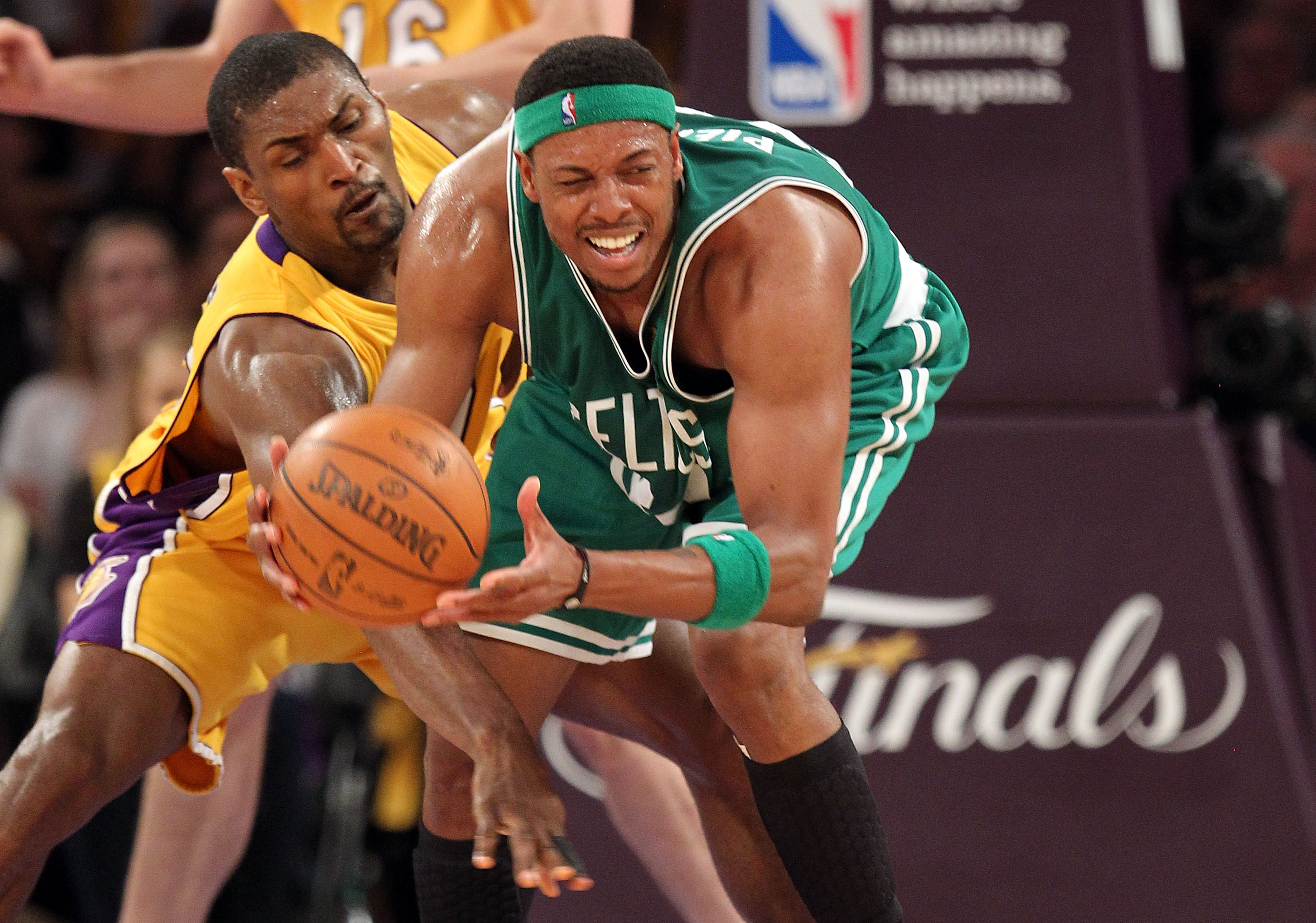 LOS ANGELES, CA - JUNE 17:  Paul Pierce #34 of the Boston Celtics looks to move the ball as he is covered by Ron Artest #37 of the Los Angeles Lakers in the first quarter of Game Seven of the 2010 NBA Finals at Staples Center on June 17, 2010 in Los Angel