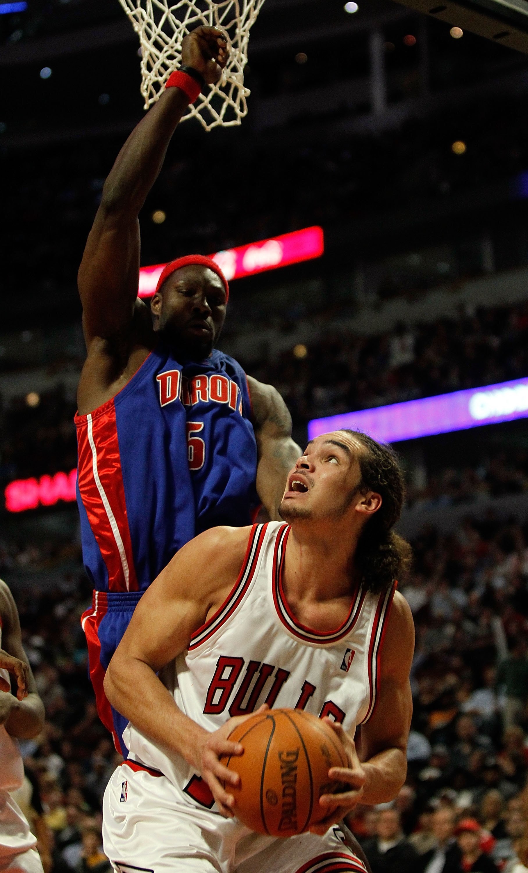 CHICAGO - DECEMBER 02: Joakim Noah #13 of the Chicago Bulls waits to put up a shot against Ben Wallace #6 of the Detroit Pistons at the United Center on December 2, 2009 in Chicago, Illinois. The Bulls defeated the Pistons 92-85. NOTE TO USER: User expres