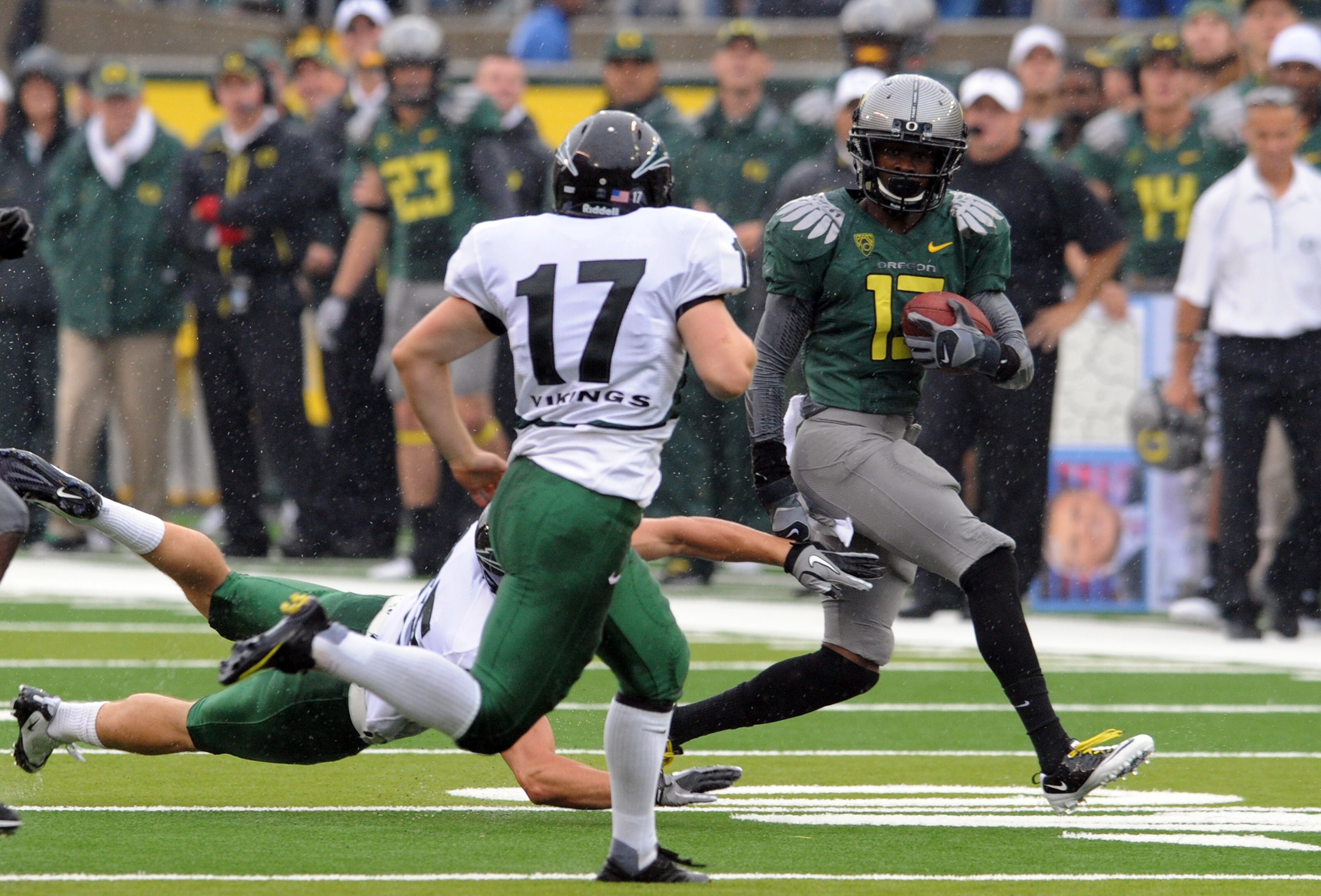 EUGENE, OR - SEPTEMBER 18: Cornerback Cliff Harris #13 of the Oregon Ducks returns a punt as punter Robert Truax #17 of the Portland State Vikings closes in during the first quarter of the game at Autzen Stadium on September 18, 2010 in Eugene, Oregon. Or