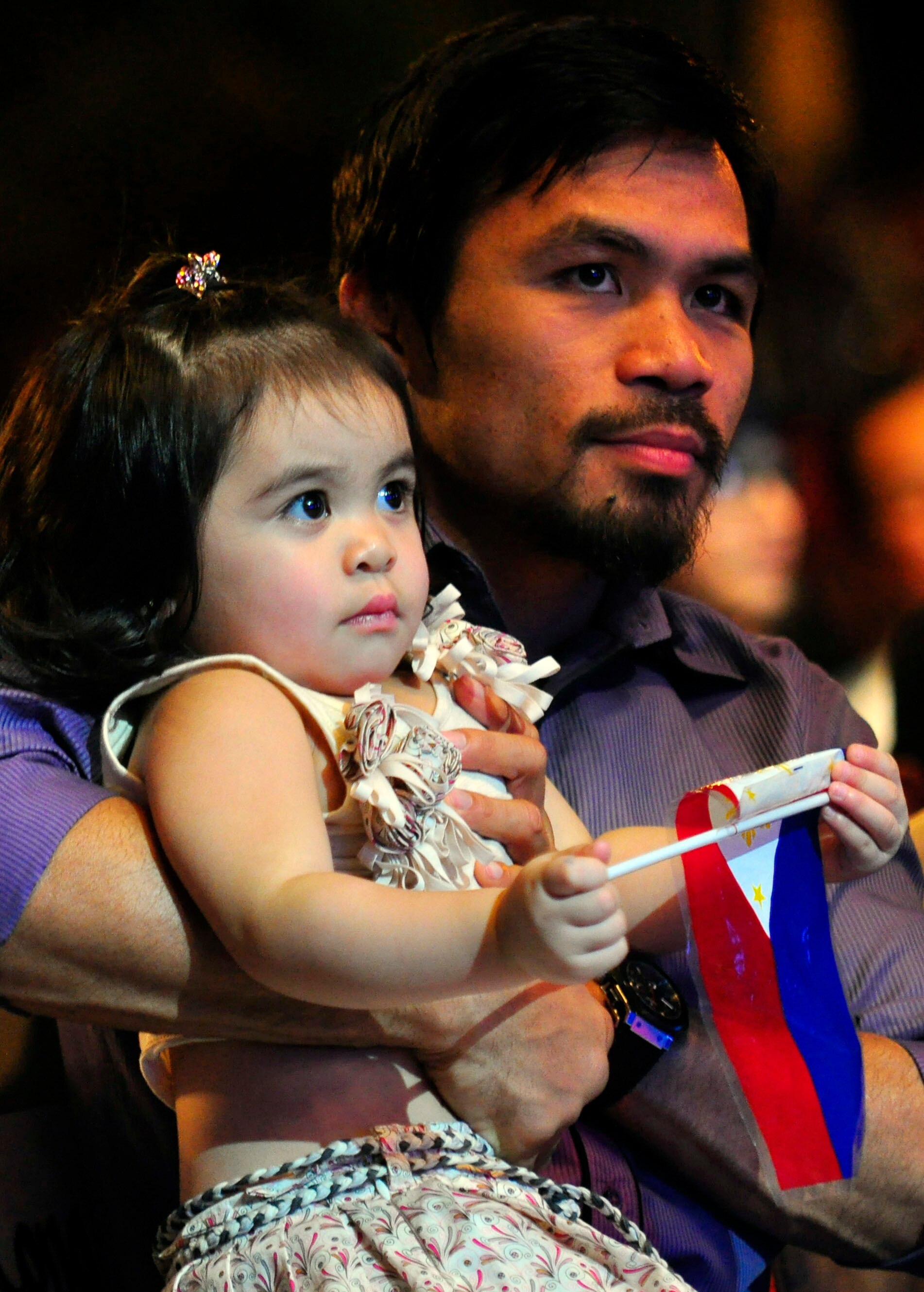 MANILA, PHILIPPINES - NOVEMBER 20:  Boxer and congressman, Manny Pacquiao attends his concert in Manila with wife Jinky and youngest daughter Qeen Elizabeth following his win of the WBC super welterweight crown against Mexican Antonio Margarito on Novembe