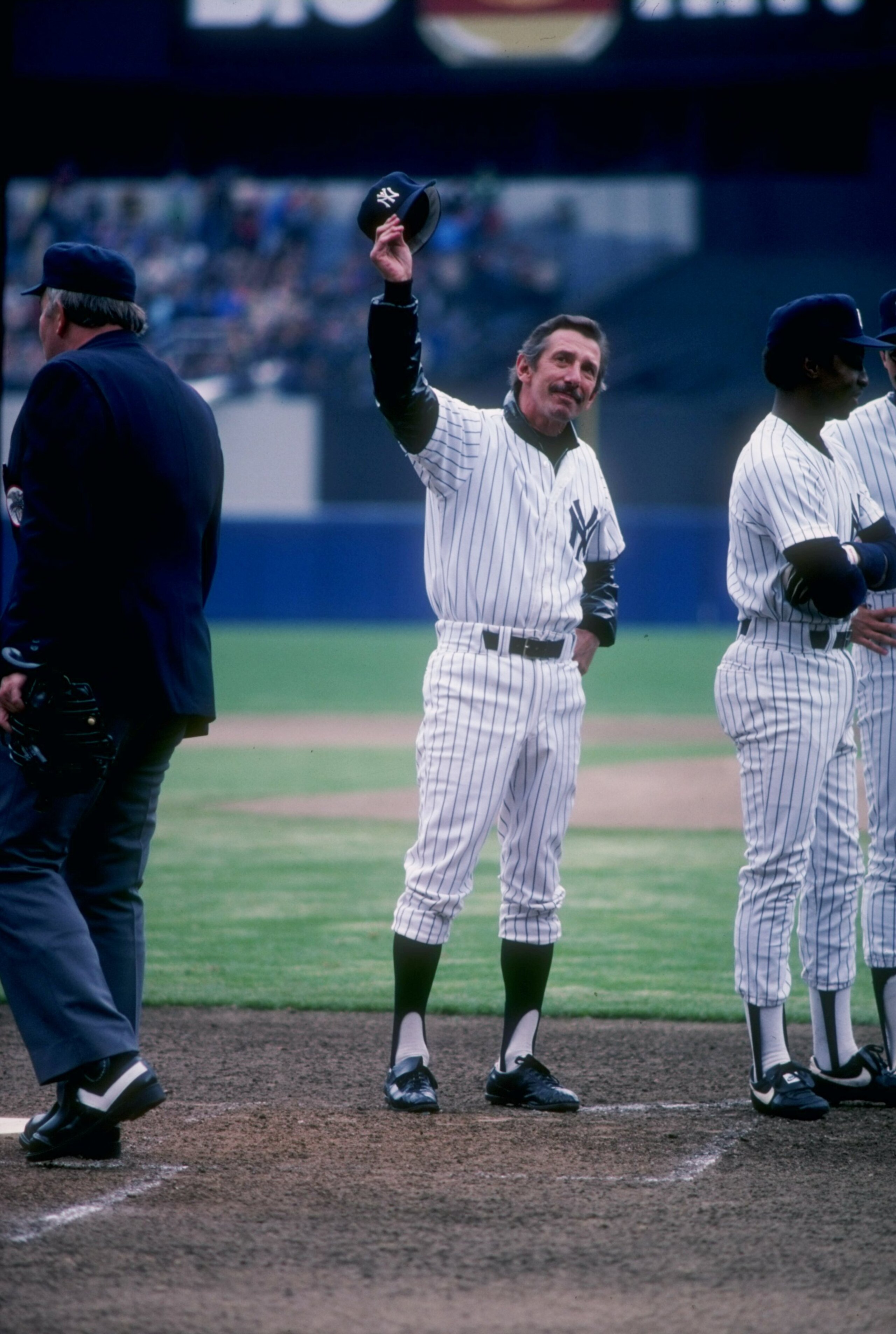 Manager Billy Martin of the New York Yankees waves to the crowd at Yankee Stadium in the Bronx, New York. Manager Billy Martin of the New York Yankees waves to the crowd at Yankee Stadium in the Bronx, New York.