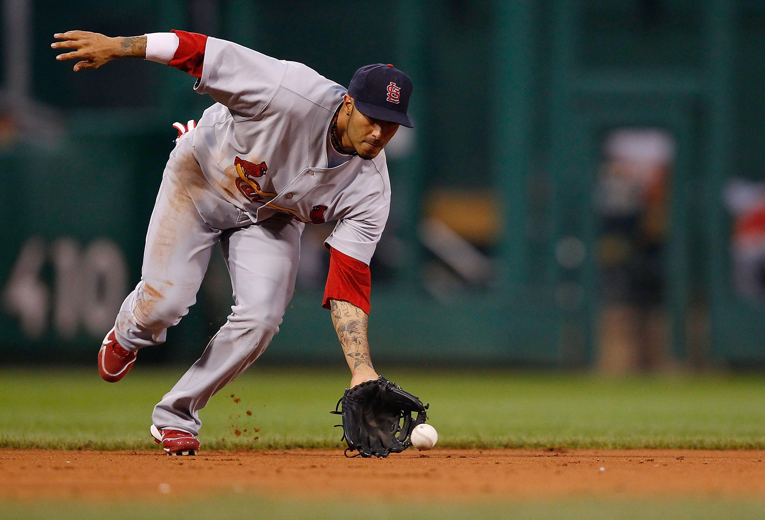 PITTSBURGH - AUGUST 23:  Felipe Lopez #3 of the St Louis Cardinals fields a ground ball against the Pittsburgh Pirates during the game on August 23, 2010 at PNC Park in Pittsburgh, Pennsylvania.  (Photo by Jared Wickerham/Getty Images)