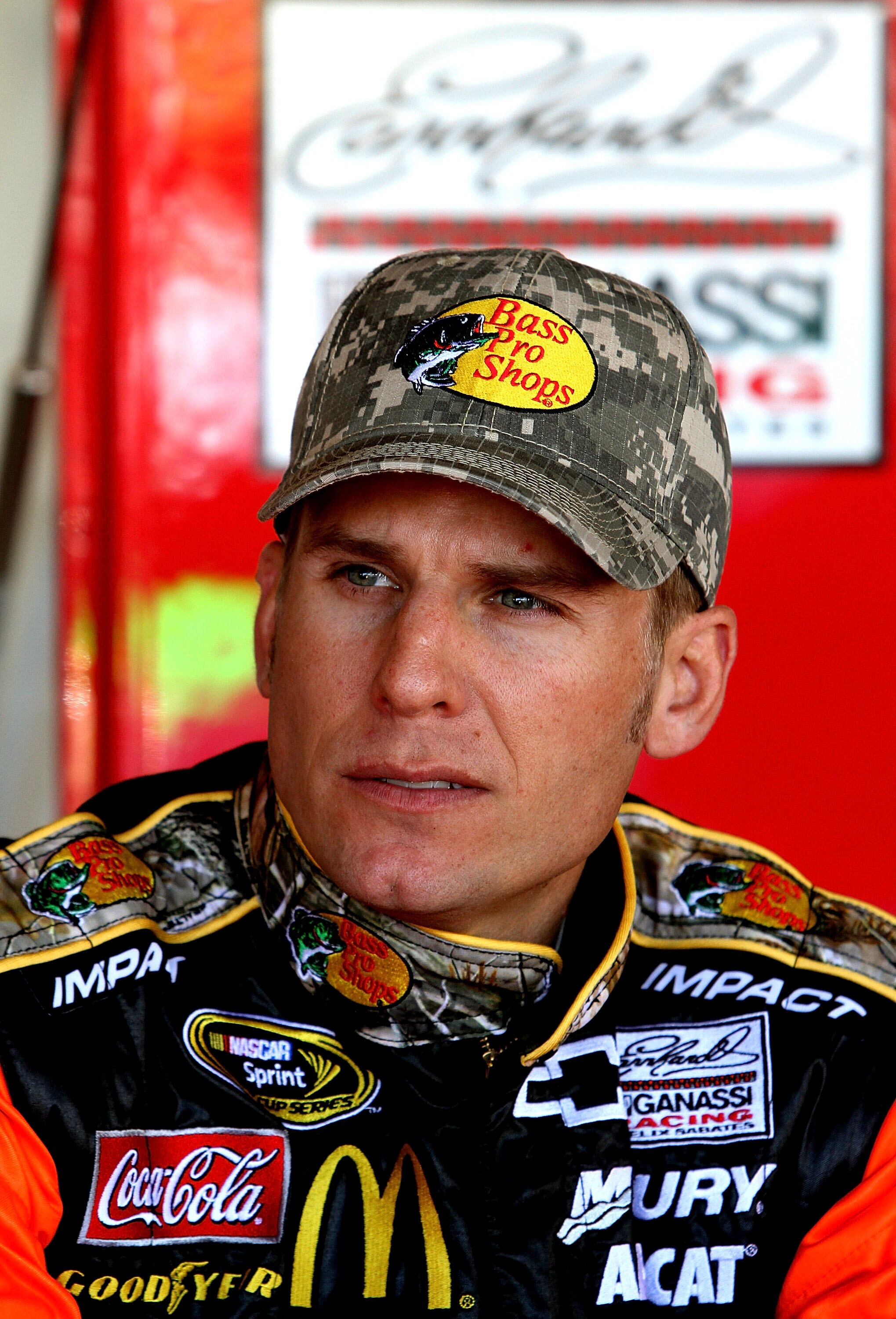 RICHMOND, VA - SEPTEMBER 10:  Jamie McMurray, driver of the #1 Bass Pro Shops/Tracker Chevrolet, sits in the garage during practice for the NASCAR Sprint Cup Series Air Guard 400 at Richmond International Raceway on September 10, 2010 in Richmond, Virgini
