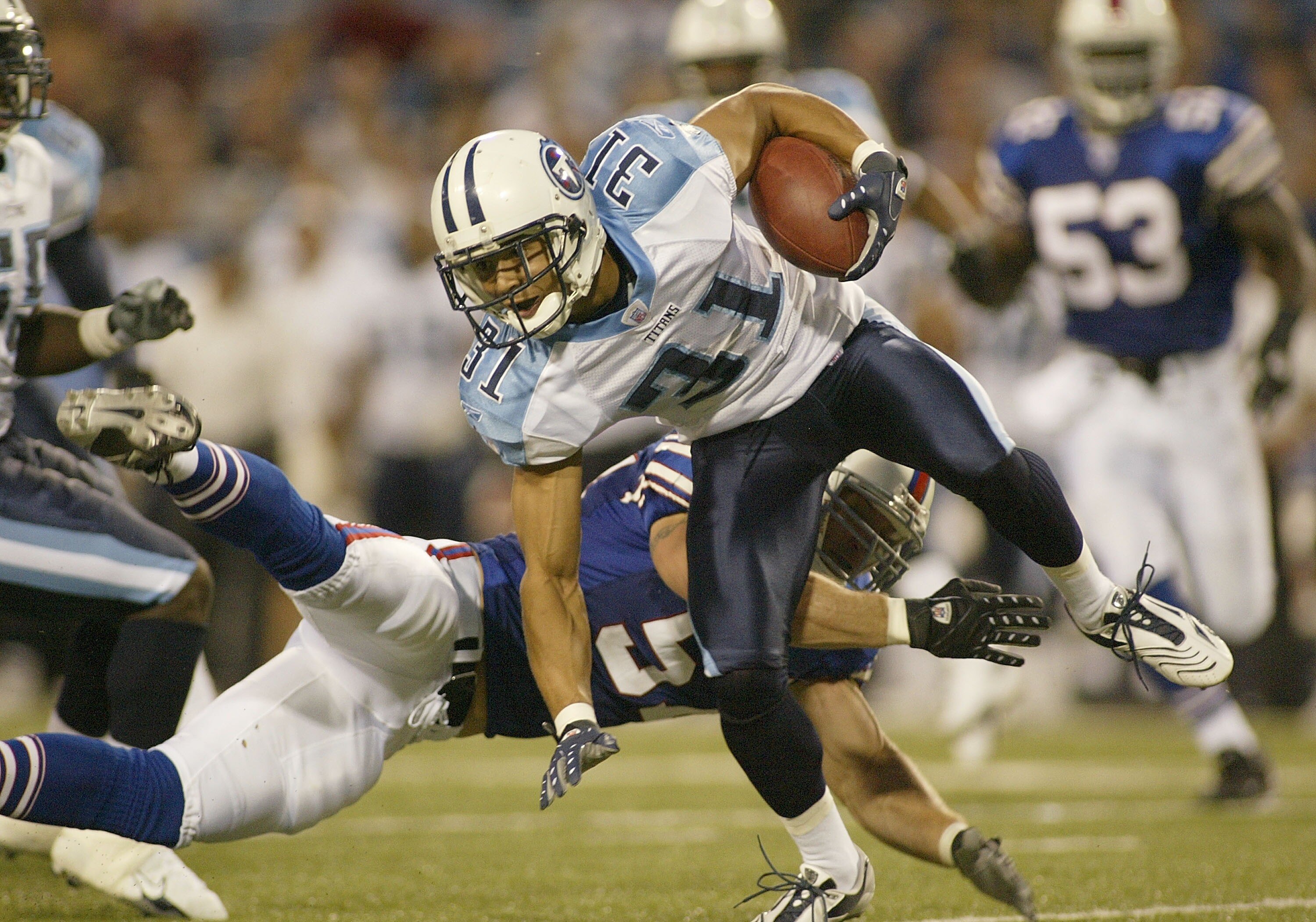 ORCHARD PARK - AUGUST 24:  Cortland Finnegan #31 of the Tennessee Titans is runs against the Buffalo Bills at a preseason game at Ralph Wilson Stadium August 24, 2007 in Orchard Park, New York.  (Photo by Rick Stewart/Getty Images)