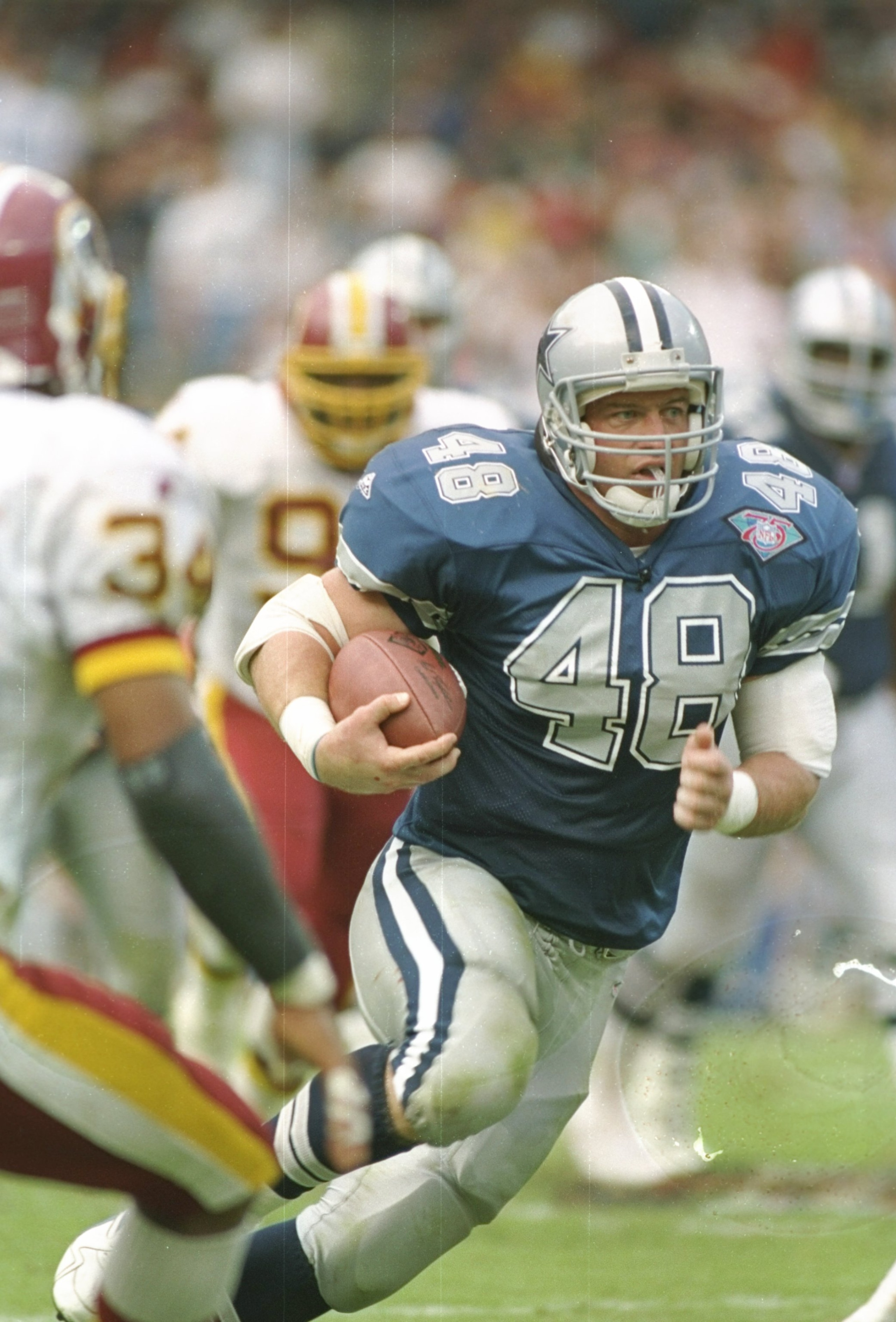 2 Oct 1994:  Running back Daryl Johnston of the Dallas Cowboys moves the ball during a game against the Washington Redskins at RFK Stadium in Washington, D. C.  The Cowboys won the game, 34-7. Mandatory Credit: Jonathan Daniel  /Allsport