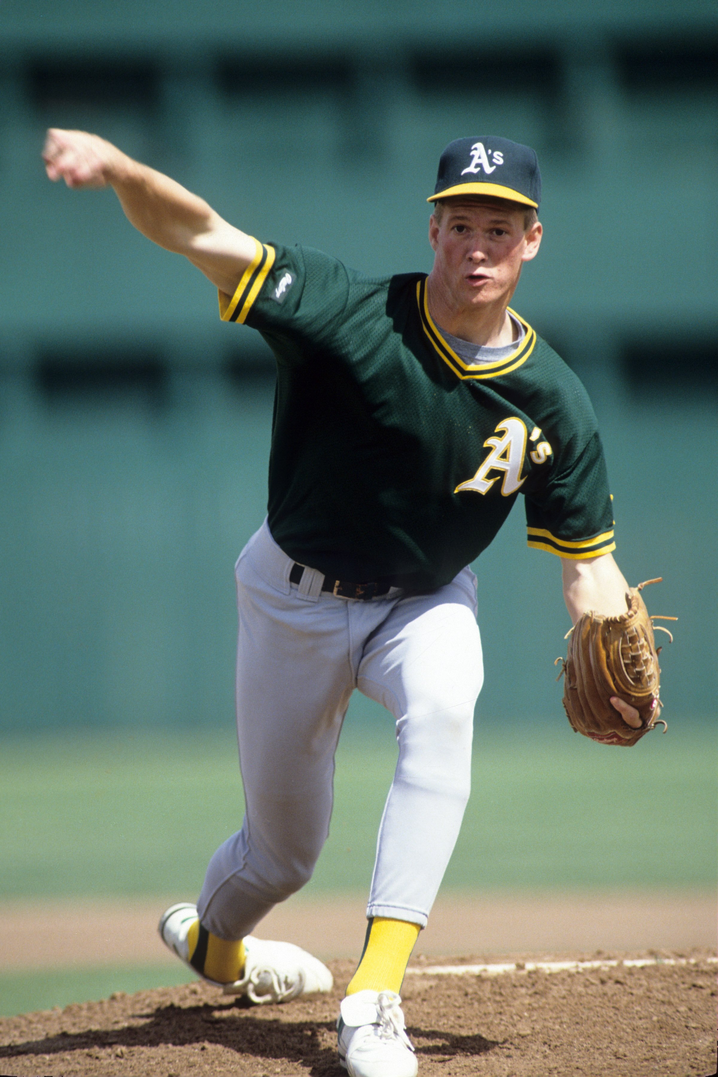 CIRCA 1991:  Pitcher Todd Van Poppel #59 of the Oakland Athletics pitches during spring training circa 1991. (Photo by Otto Greule Jr./Getty Images)