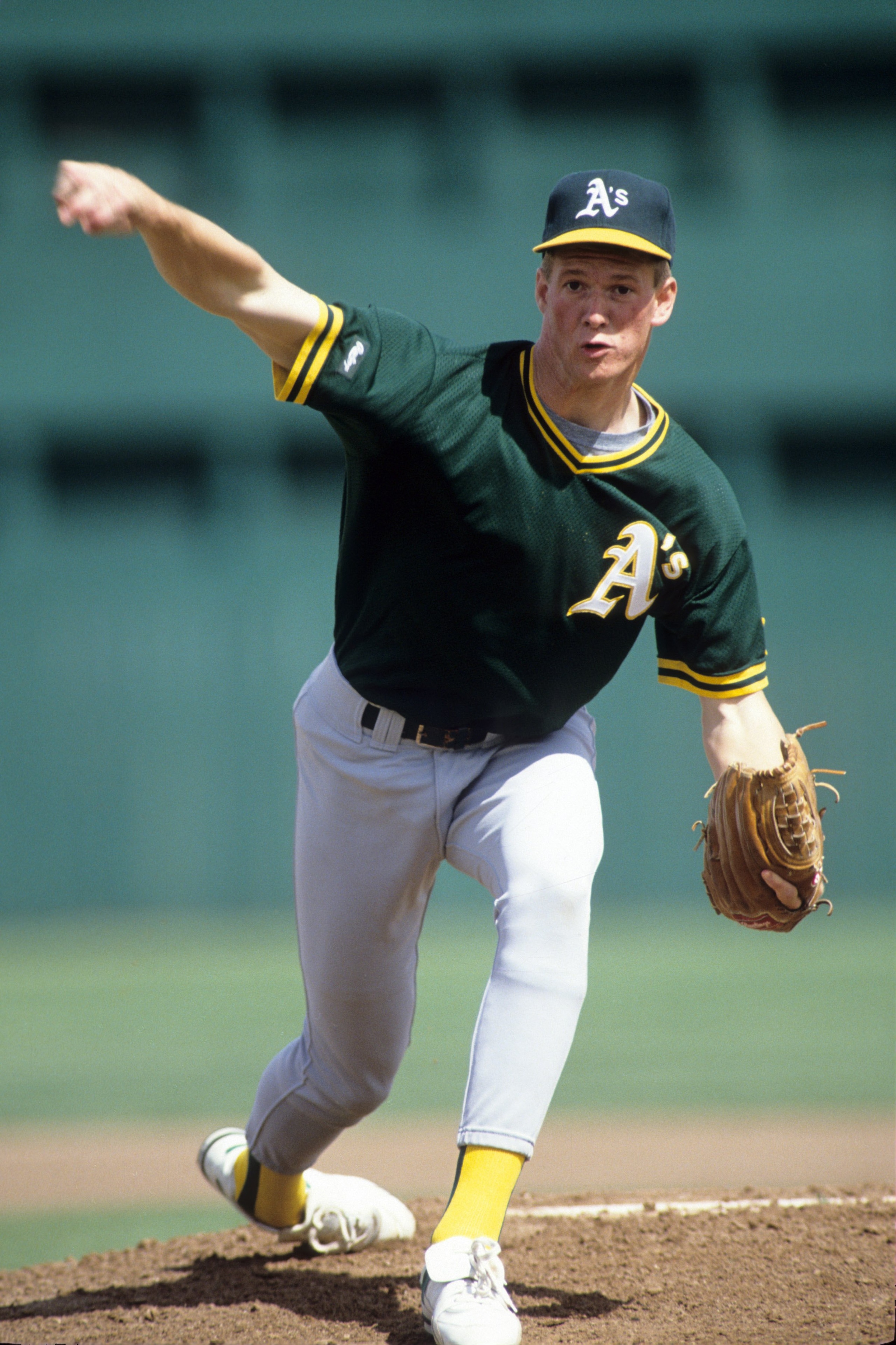 CIRCA 1991:  Pitcher Todd Van Poppel #59 of the Oakland Athletics pitches during spring training circa 1991. (Photo by Otto Greule Jr./Getty Images)