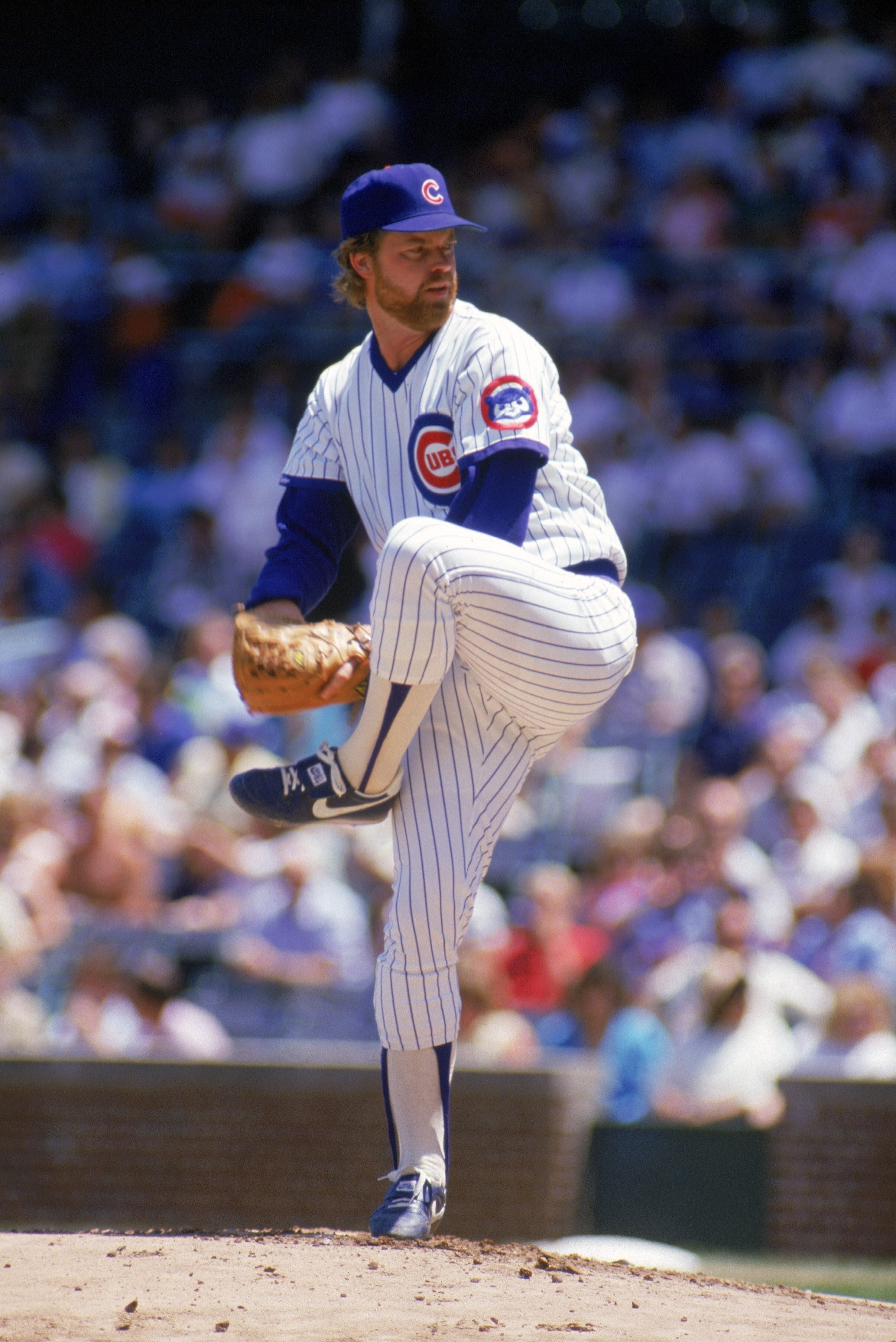 CHICAGO - 1987:  Rick Sutcliffe #40 of the Chicago Cubs winds back to pitch during a game in the 1987 season at Wrigley Field in Chicago, Illinois . ( Photo by: Jonathan Daniel/ Getty Images )
