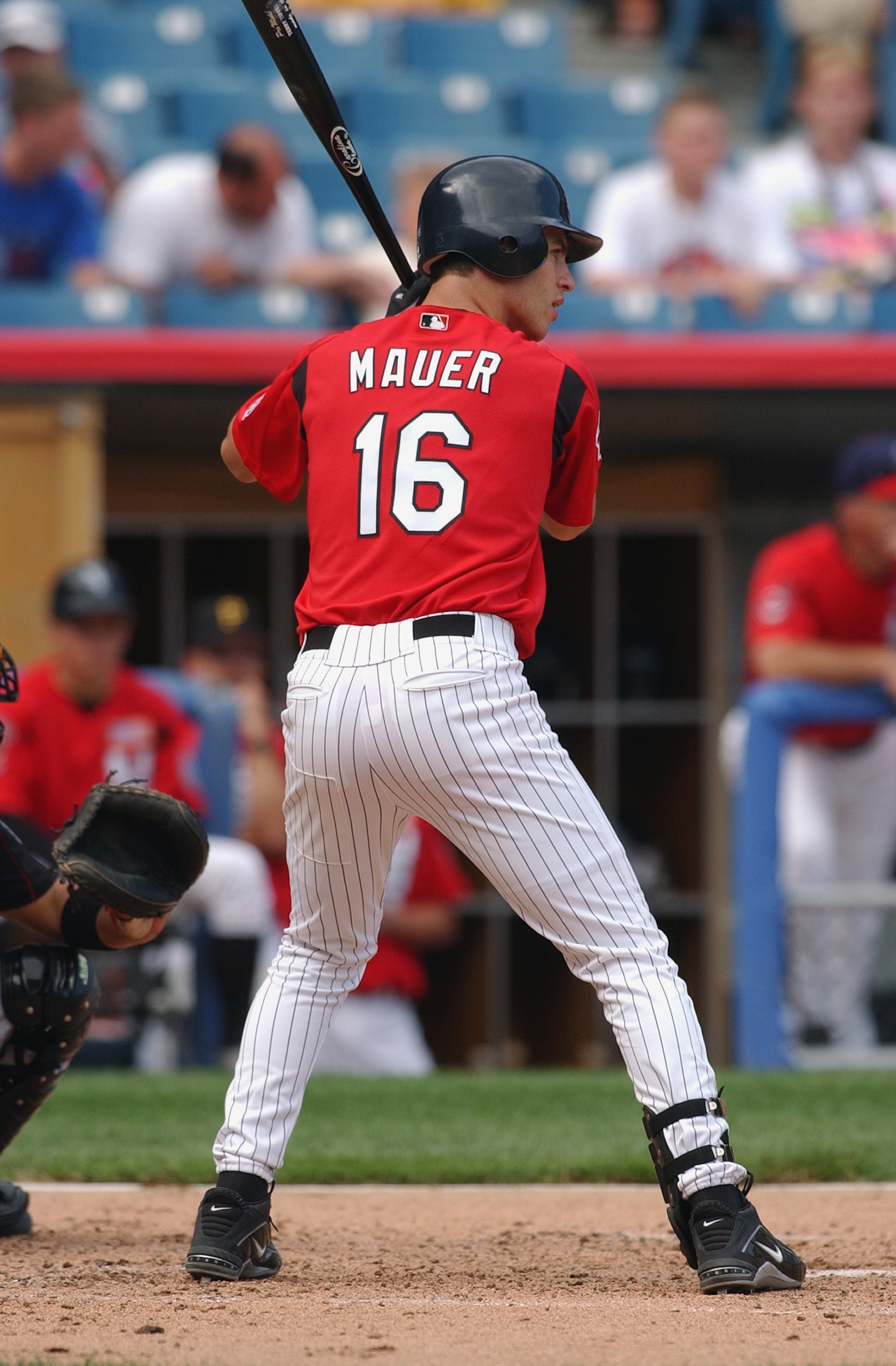 CHICAGO - JULY 13:  Catcher Joe Mauer #16, a player in the Minnesota Twins farm system playing for the USA team bats against the World team during the All-Star Futures Game on July 13, 2003 at U.S. Cellular Field in Chicago, Illinois.  The U.S. won 3-2.
