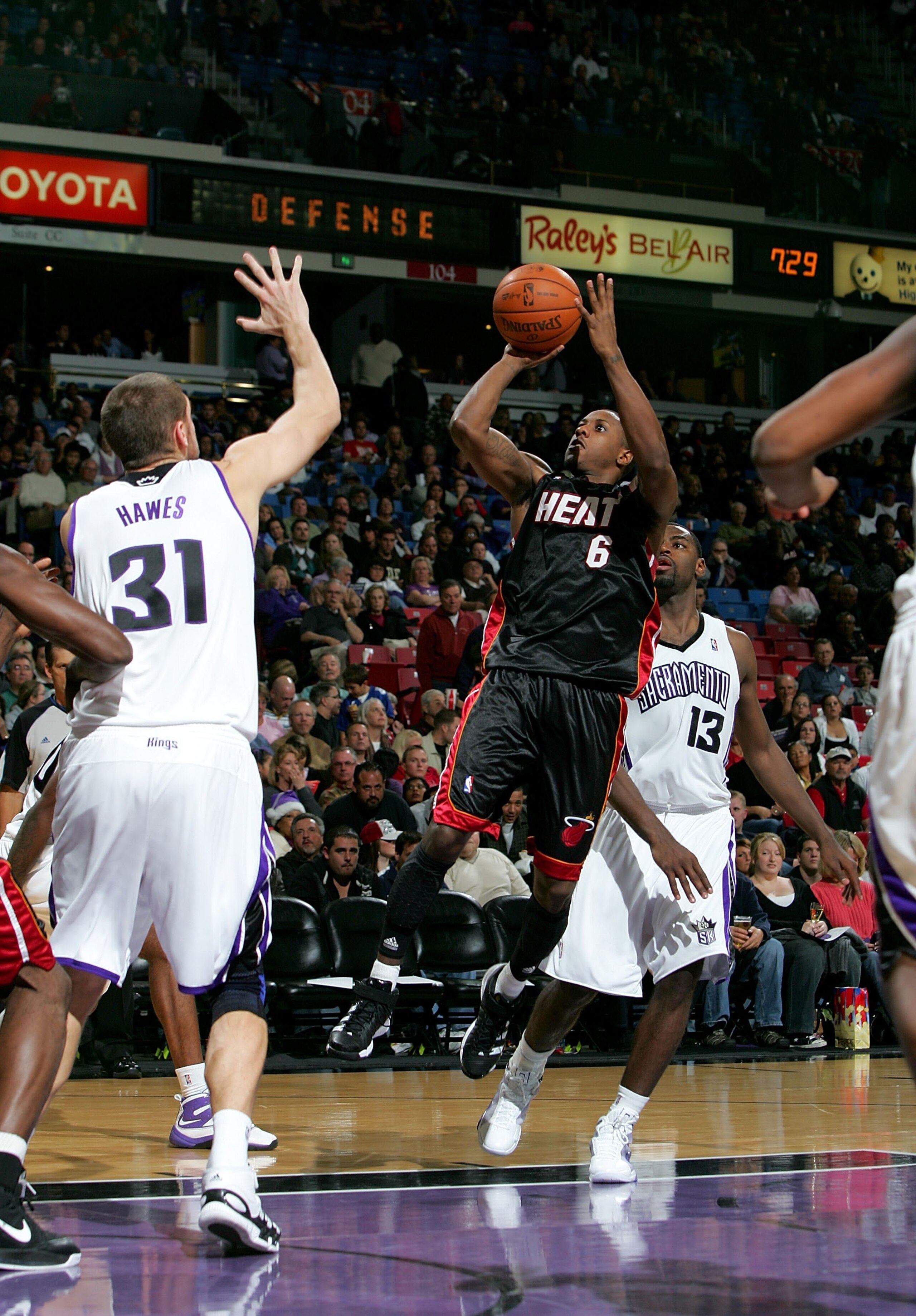 SACRAMENTO, CA - DECEMBER 06:  Mario Chalmers #6 of the Miami Heat in action during their game against the Sacramento Kings at ARCO Arena on December 6, 2009 in Sacramento, California.  NOTE TO USER: User expressly acknowledges and agrees that, by downloa