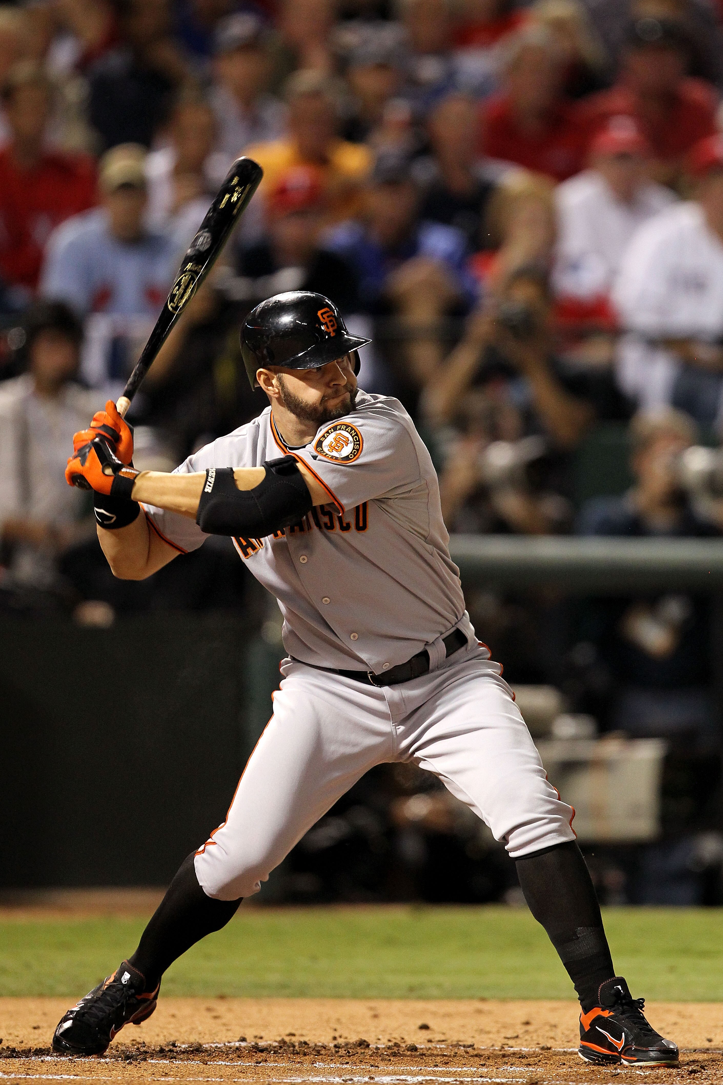 ARLINGTON, TX - NOVEMBER 01:  Cody Ross #13 of  the San Francisco Giants bats against the Texas Rangers in Game Five of the 2010 MLB World Series at Rangers Ballpark in Arlington on November 1, 2010 in Arlington, Texas. The Giants won 3-1.  (Photo by Rona