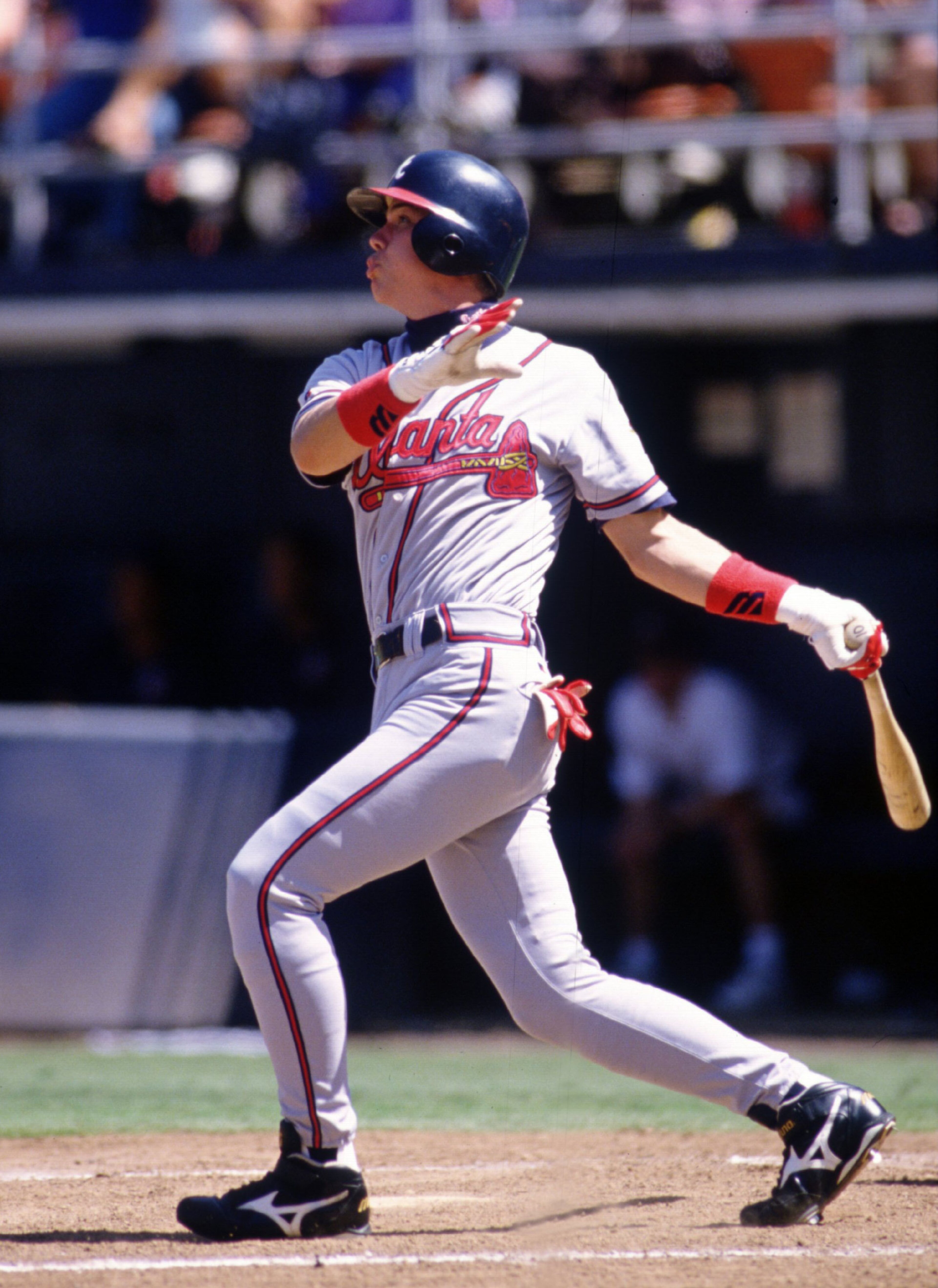14 Jul 1995: ATLANTA THIRD BASEMAN CHIPPER JONES WATCHES THE BALL AFTER CONNECTING ON A PITCH DURING THE BRAVES 6-2 VICTORY OVER THE SAN DIEGO PADRES AT JACK MURPHY STADIUM IN SAN DIEGO, CALIFORNIA.
