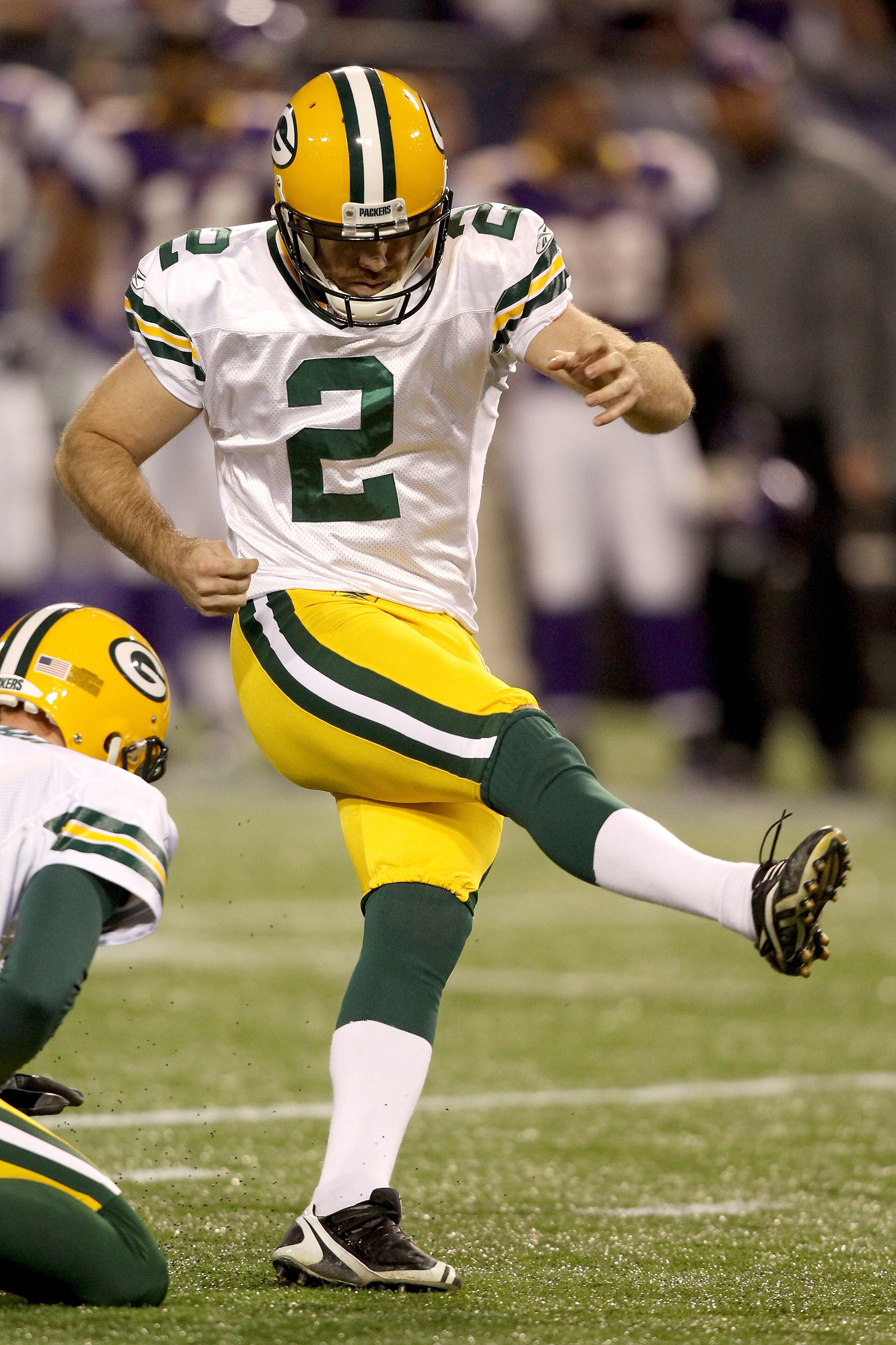 MINNEAPOLIS - NOVEMBER 21: Mason Crosby #2 of the Green Bay Packers kicks a field goal against the Minnesota Vikings at the Hubert H. Humphrey Metrodome on November 21, 2010 in Minneapolis, Minnesota. (Photo by Matthew Stockman/Getty Images) MINNEAPOLIS - NOVEMBER 21: Mason Crosby #2 of the Green Bay Packers kicks a field goal against the Minnesota Vikings at the Hubert H. Humphrey Metrodome on November 21, 2010 in Minneapolis, Minnesota. (Photo by Matthew Stockman/Getty Images)