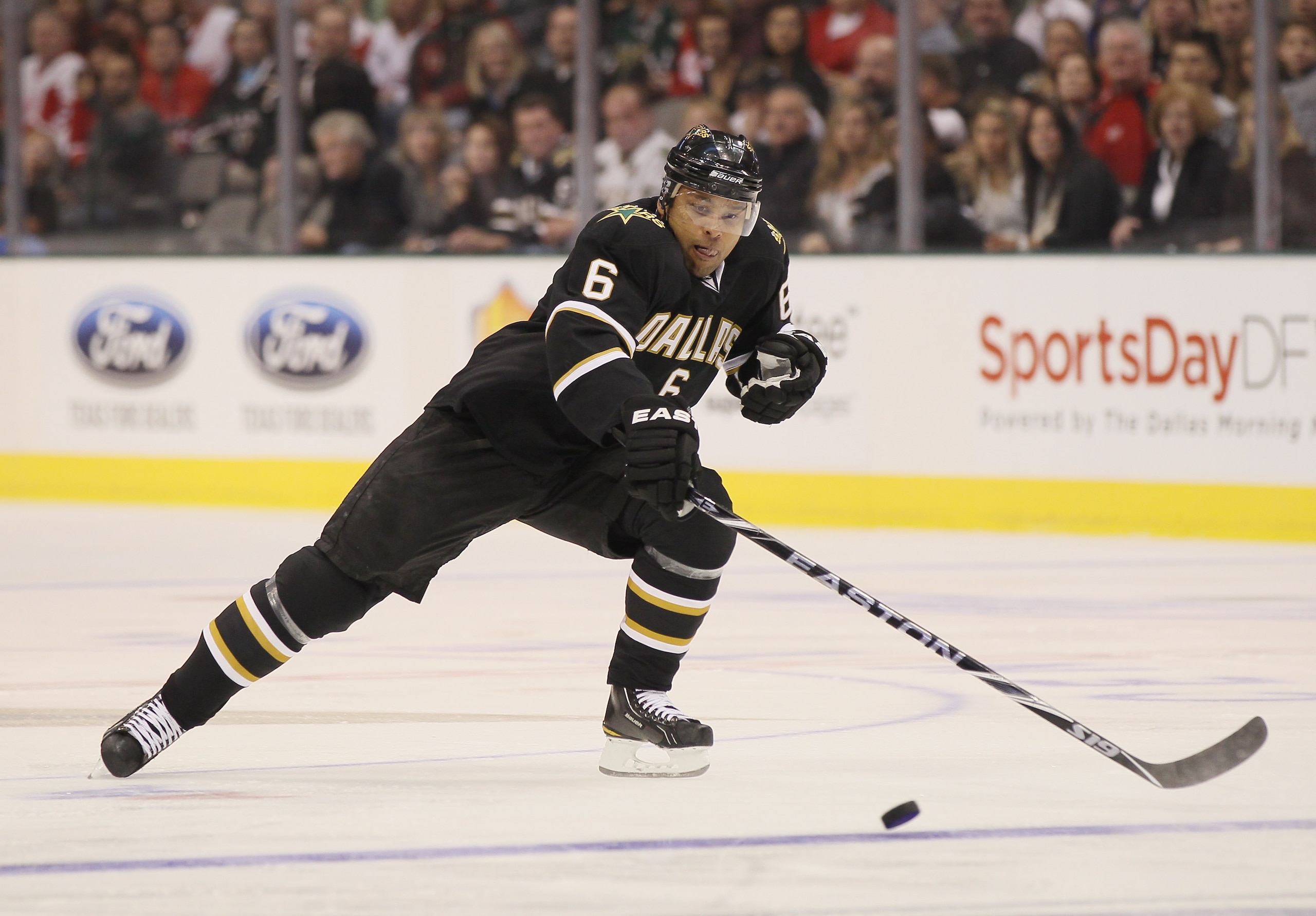 DALLAS - OCTOBER 14:  Trevor Daley #6 of the Dallas Stars takes the puck in the first quarter against the Detroit Red Wings on October 14, 2010 at the American Airlines Center in Dallas, Texas.  (Photo by Elsa/Getty Images)