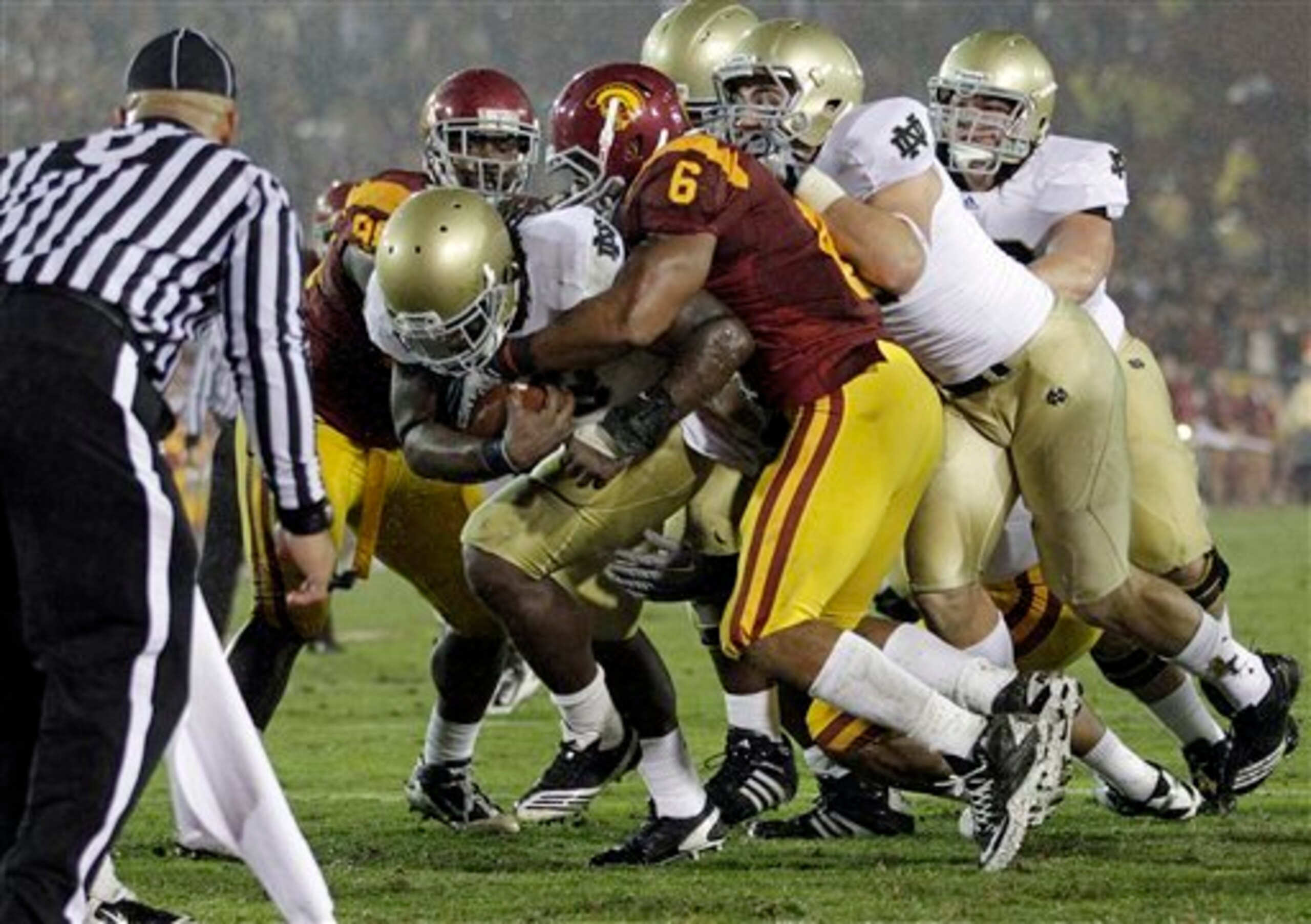 Robert Hughes bulls his way into the endzone for the winning touchdown.