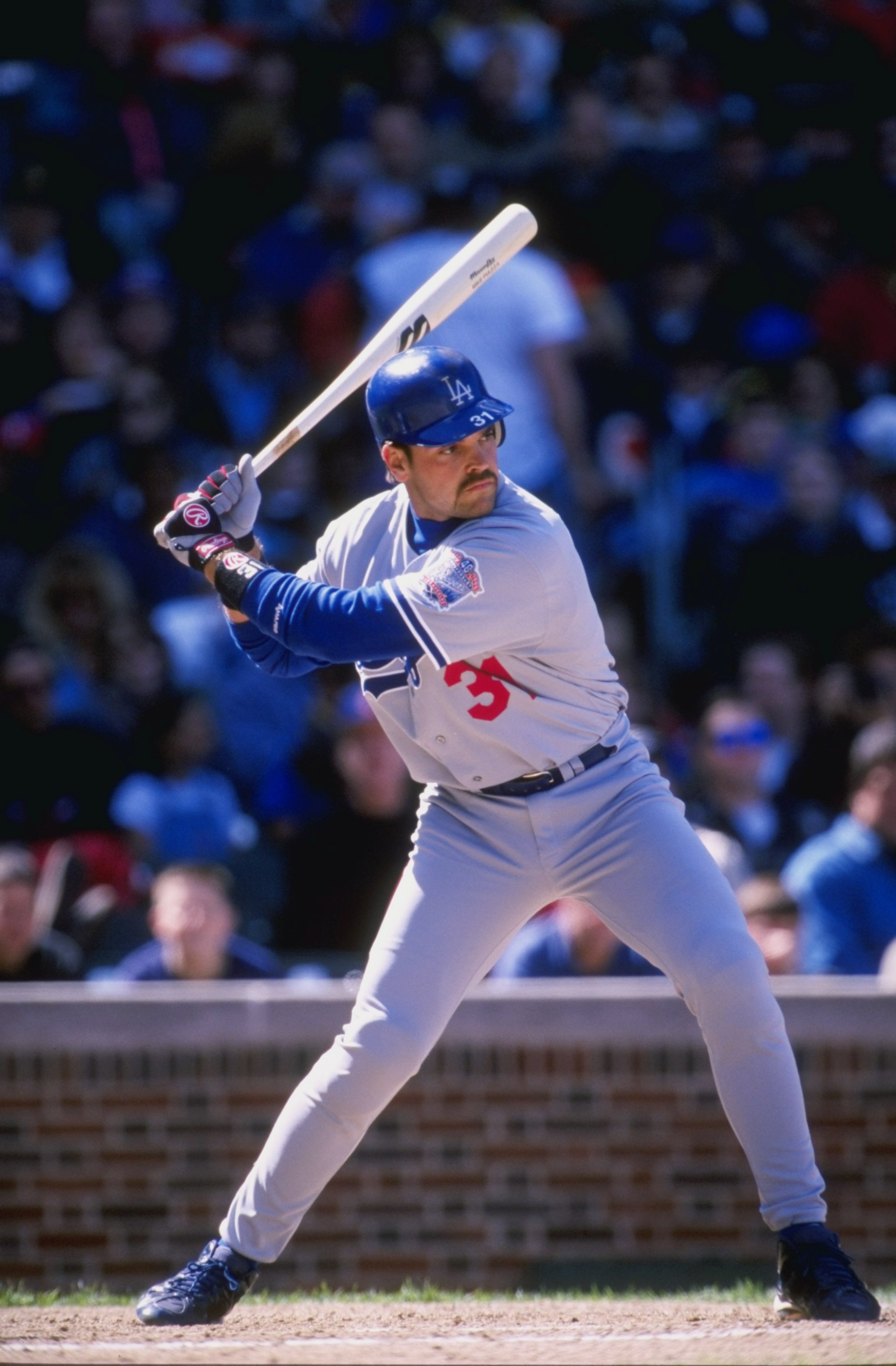 17 Apr 1998: Catcher Mike Piazza of the Los Angeles Dodgers in action during a game against the Chicago Cubs at Wrigley Field in Chicago, Illinois. The Dodgers defeated the Cubs 10-3. Mandatory Credit: Harry How /Allsport 17 Apr 1998: Catcher Mike Piazza of the Los Angeles Dodgers in action during a game against the Chicago Cubs at Wrigley Field in Chicago, Illinois. The Dodgers defeated the Cubs 10-3. Mandatory Credit: Harry How /Allsport