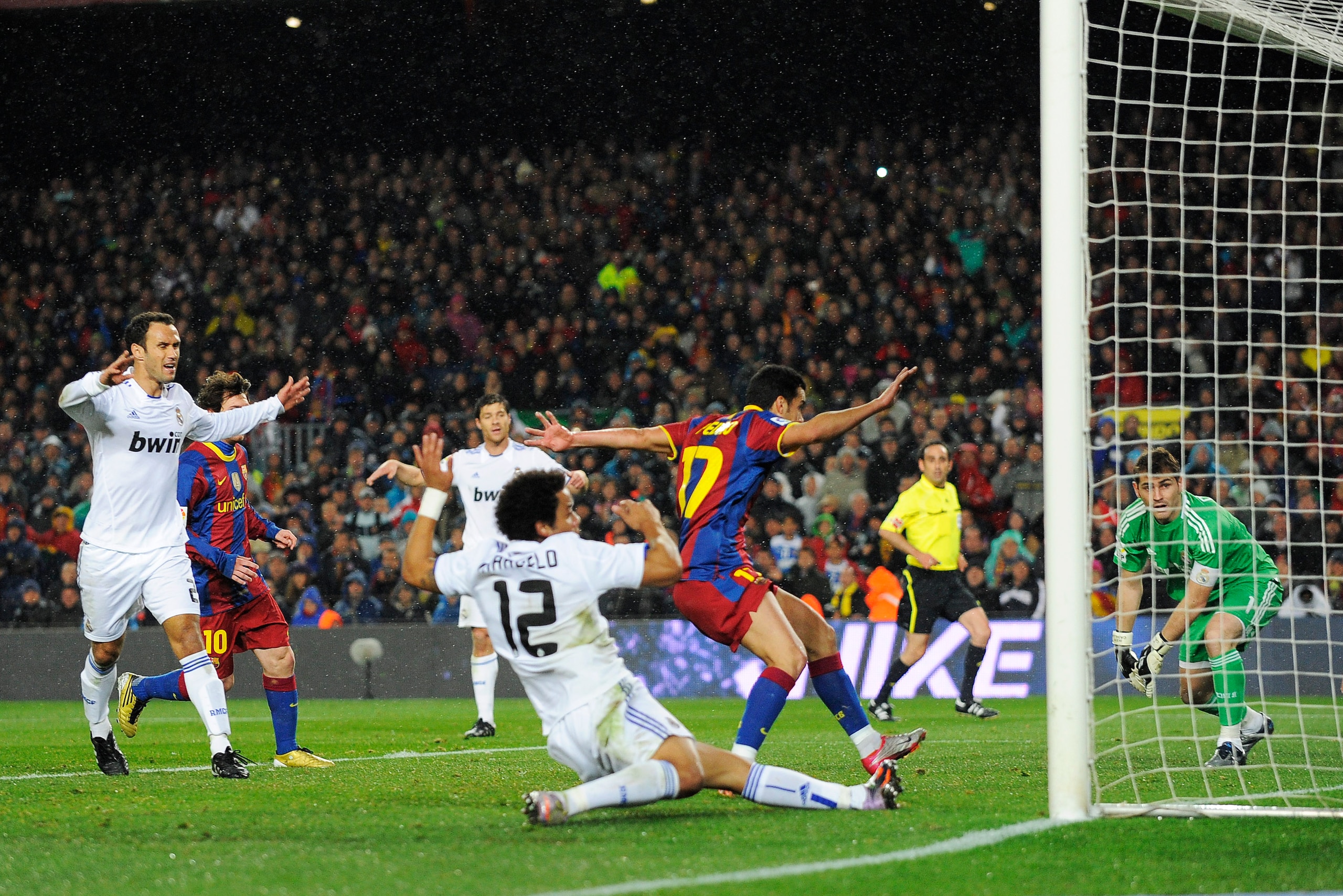 BARCELONA, SPAIN - NOVEMBER 29: Pedro Rodriguez of Barcelona (2nd R) scores the second goal during the La Liga match between Barcelona and Real Madrid at the Camp Nou Stadium on November 29, 2010 in Barcelona, Spain. Barcelona won the match 5-0. (Photo BARCELONA, SPAIN - NOVEMBER 29: Pedro Rodriguez of Barcelona (2nd R) scores the second goal during the La Liga match between Barcelona and Real Madrid at the Camp Nou Stadium on November 29, 2010 in Barcelona, Spain. Barcelona won the match 5-0. (Photo