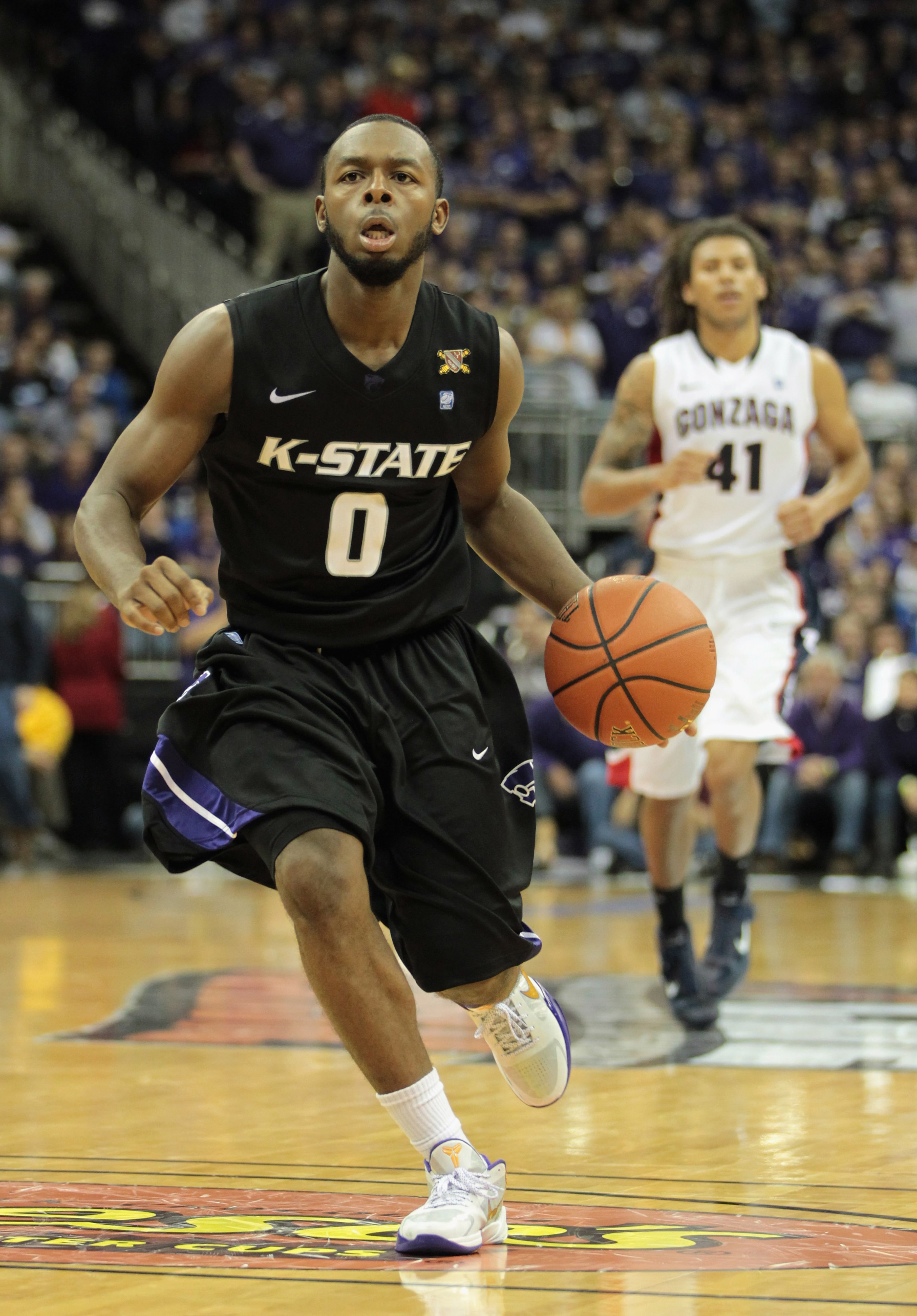 KANSAS CITY, MO - NOVEMBER 22:  Jacob Pullen #0 of the Kansas State Wildcats controls the ball during the CBE Classic game against the Gonzaga Bulldogs on November 22, 2010 at the Sprint Center in Kansas City, Missouri.  (Photo by Jamie Squire/Getty Image